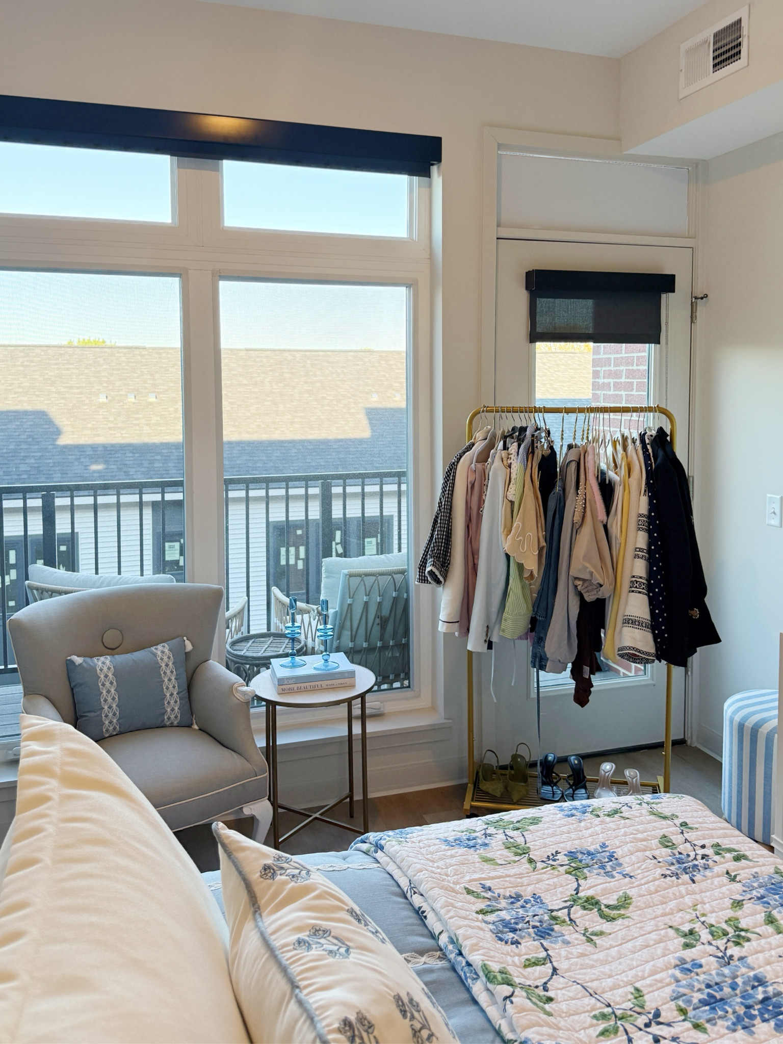 I absolutely love my Amazon clothing rack that is under $50! I keep it in the corner of my bedroom at my apartment with extra clothes and seasonal items!