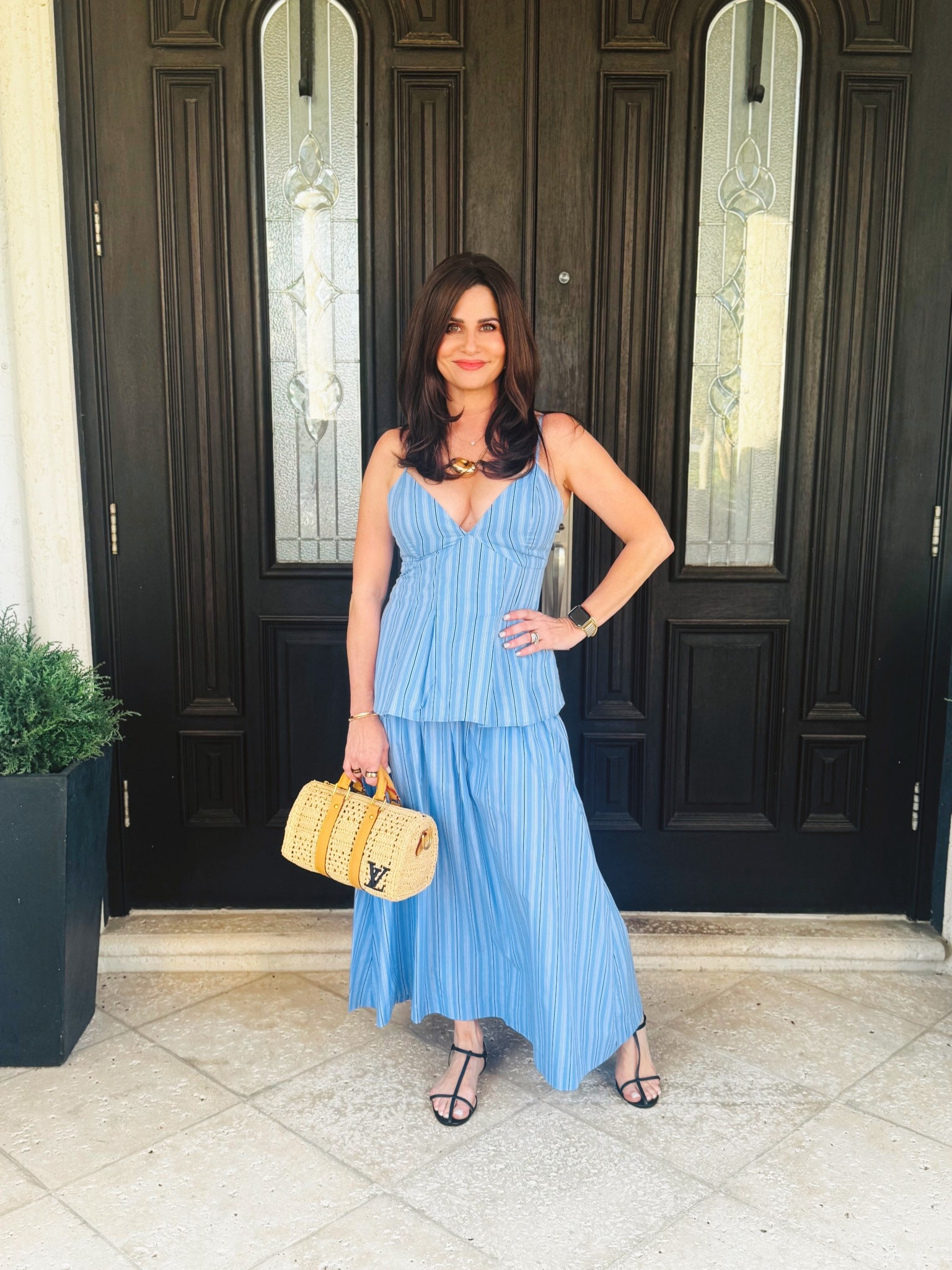 I absolutely love this look. However, this tank has several matching bottoms. A skirt , pants and shorts. So many ways to wear it. It may also be worn with  white , denim or black bottoms. Cami is a medium , skirt XS and I bought the shorts in XS. 

#LTKOver40 #LTKPetite #LTKootd