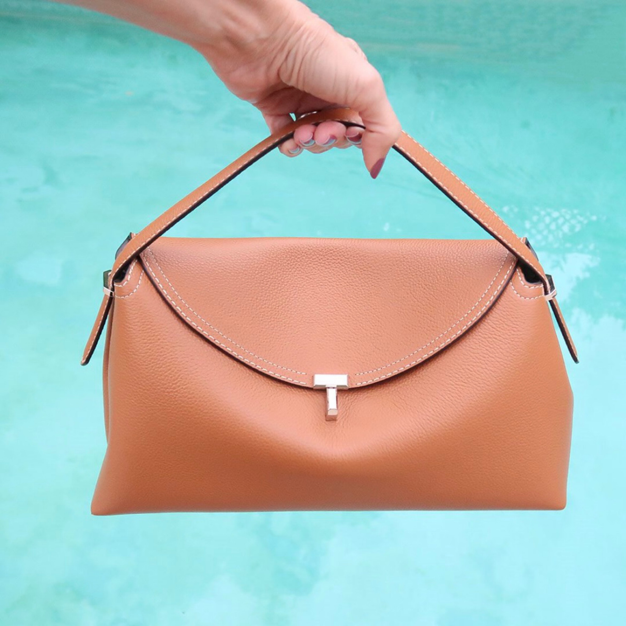 Love the Toteme T Lock bag 💕 it’s a hot IT bag right now but I found it in stock! 🎉 linked up here and full review on the blog 💕❤️

#LTKGiftGuide #LTKitbag #LTKstyletip