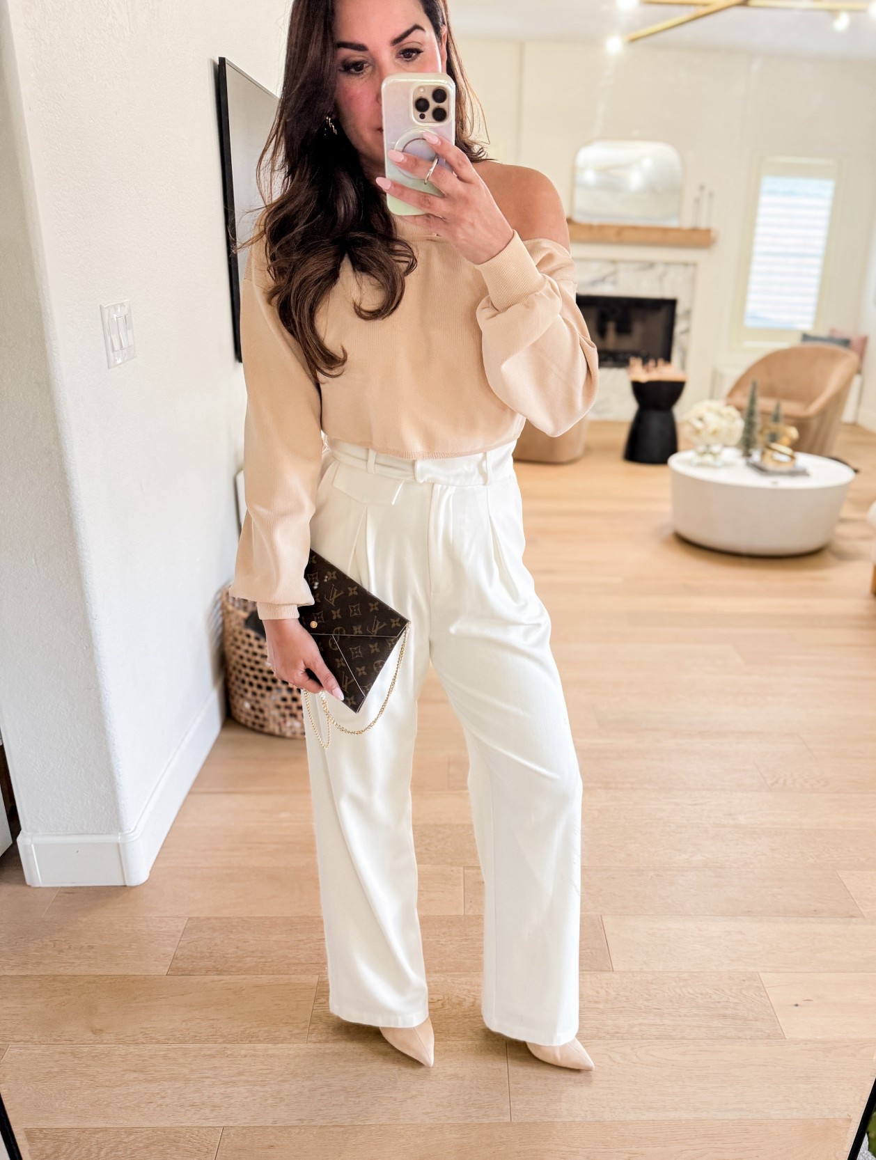 Easy winter outfit idea! Great girls night out outfit, trouser outfits, holiday outfit idea, holiday outfits, holiday party. These white trouser pants have been a go-to for awhile, they're lined and absolutely excellent quality! Also love this cutout top; looks great with the matching skirt, too!  

 #LTKootd #LTKOver40 #LTKFindsUnder100