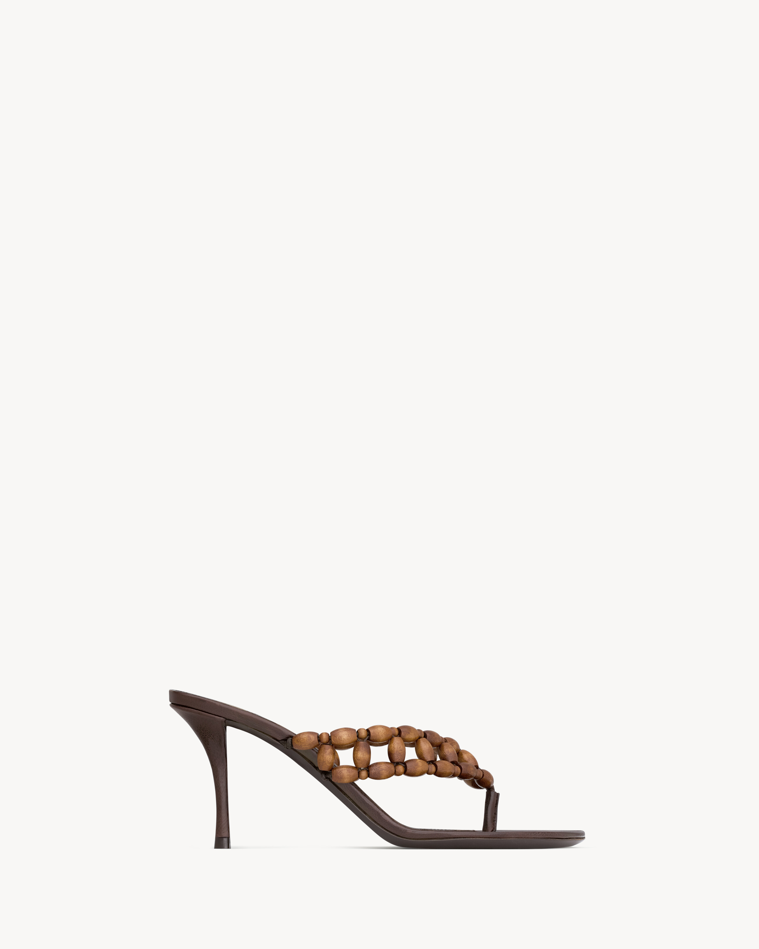 thong sandals with a stiletto heel, decorated with a wooden-bead Y-shaped strap between the toes. | Saint Laurent Inc. (Global)
