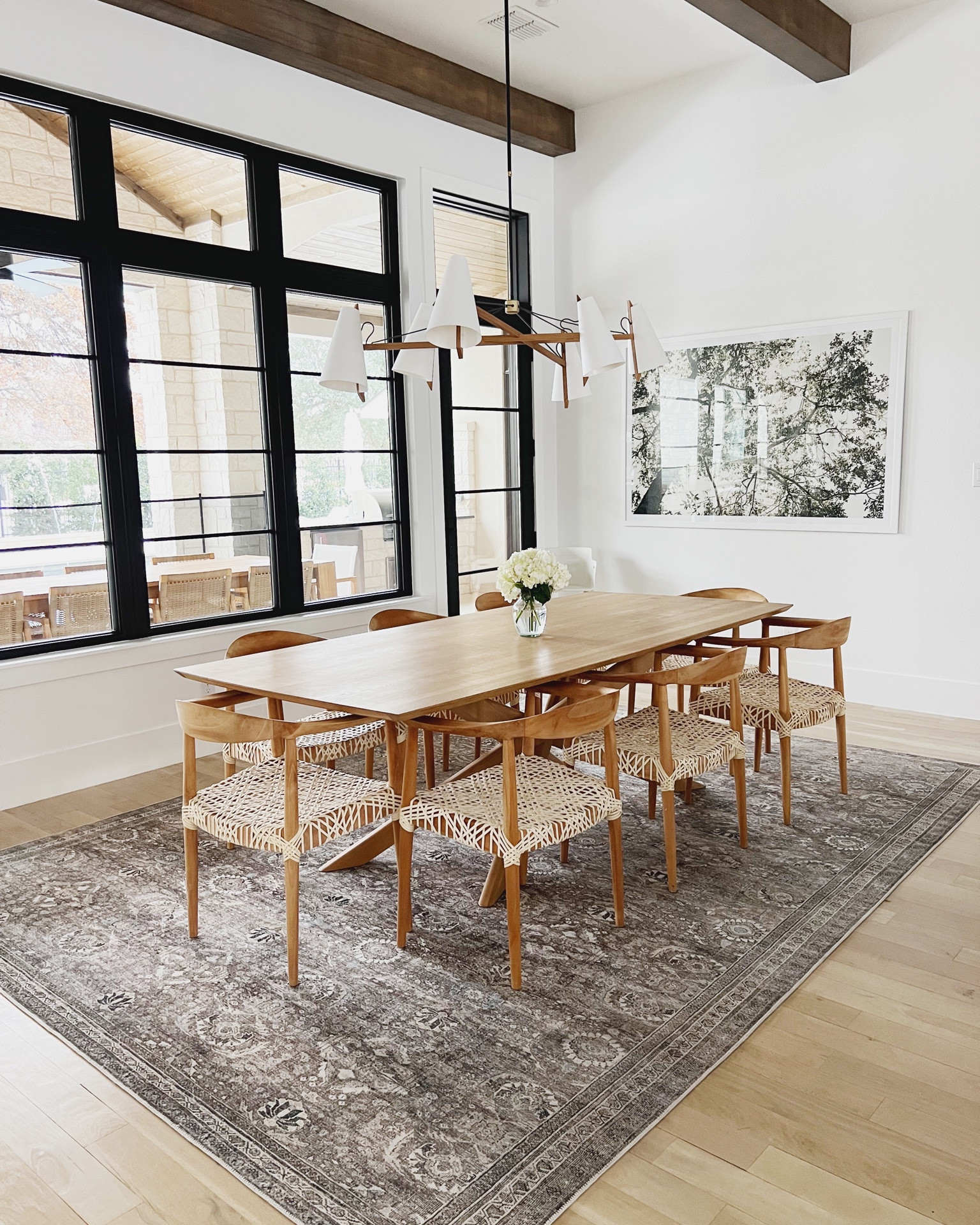 Dining room details including art, dinning chairs, and dining table  

#LTKstyletip #LTKFind #LTKhome