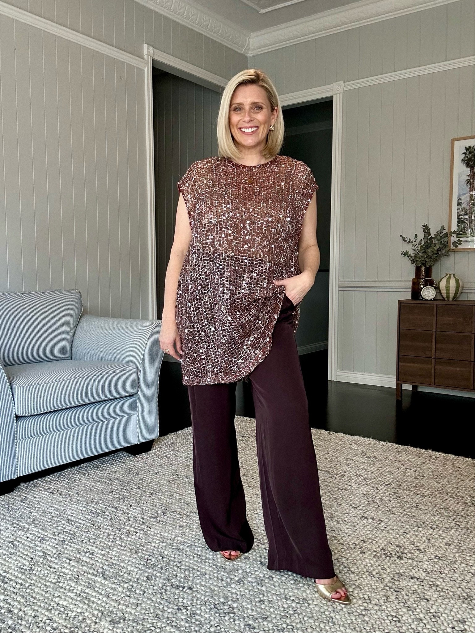 This sparkly mini dress/tunic top is such a pretty piece layered over these deep merlot coloured pants. Unfortunately it was just a tad long for me (I’m 163cm) and threw off my proportions. But it such is pretty. 
I’m wearing a size 10 and could easily go down a size.

#LTKaustralia #LTKdatenight #LTKpartywear