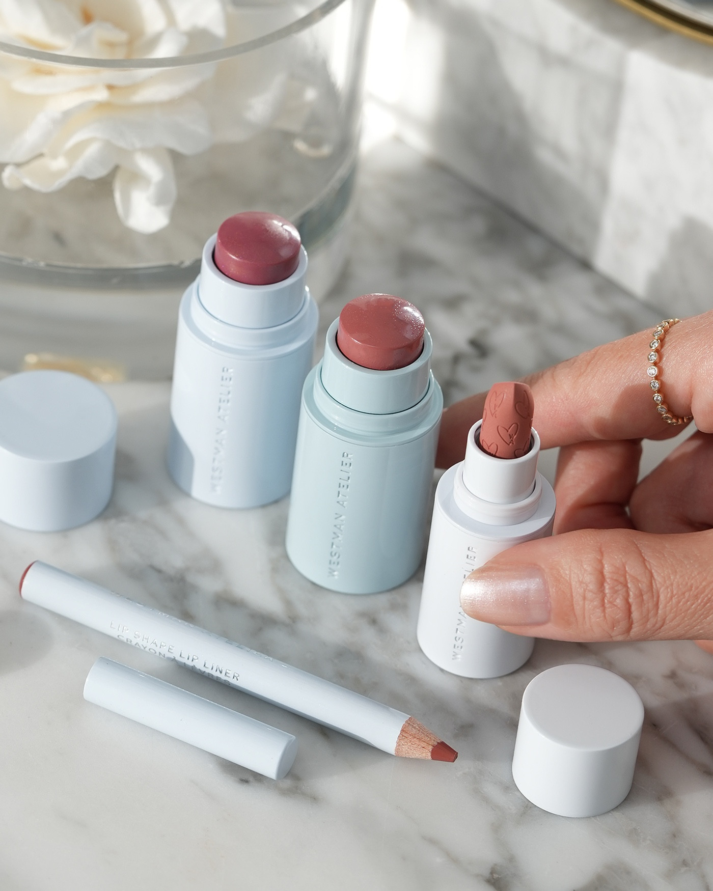 Love these minis from the Westman Atelier Petite Petal Edition Set for Holiday ❄️ super cute for travel or to throw in a small clutch for lips & cheeks! Includes the Petal shade in the Lip Shape Lip Liner, Lip Suede Matte Lipstick, Baby Cheeks Blush Stick & Lit Up Highlight Stick.

#LTKSeasonal #LTKBeauty