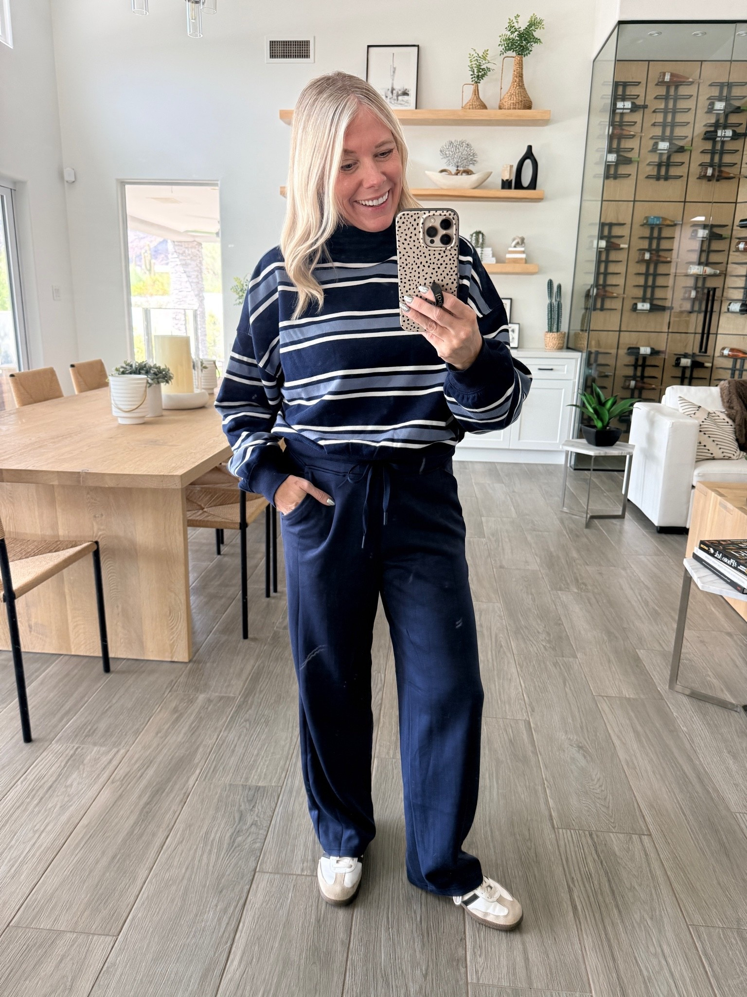 Size small striped mock neck and navy blue pants which are part of a set

#LTKootd #LTKOver40 #LTKmomlife
