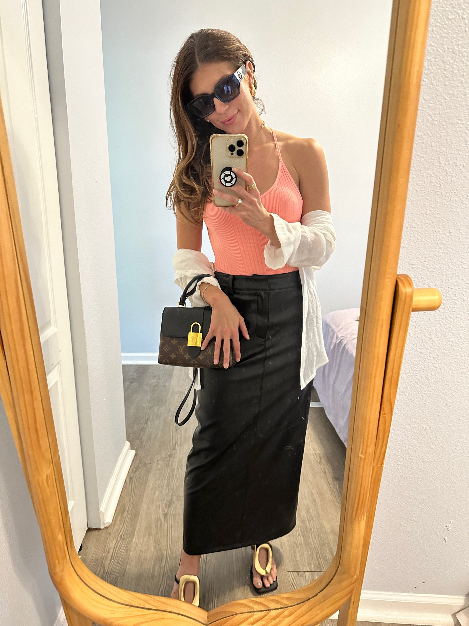 Loving black and a pop of neon/pastel! This gauzy button down has been worn to death. I love it for covering up in cold AC and for adding a 3rd piece! 

#LTKsalealert #LTKSeasonal #LTKfindsunder100