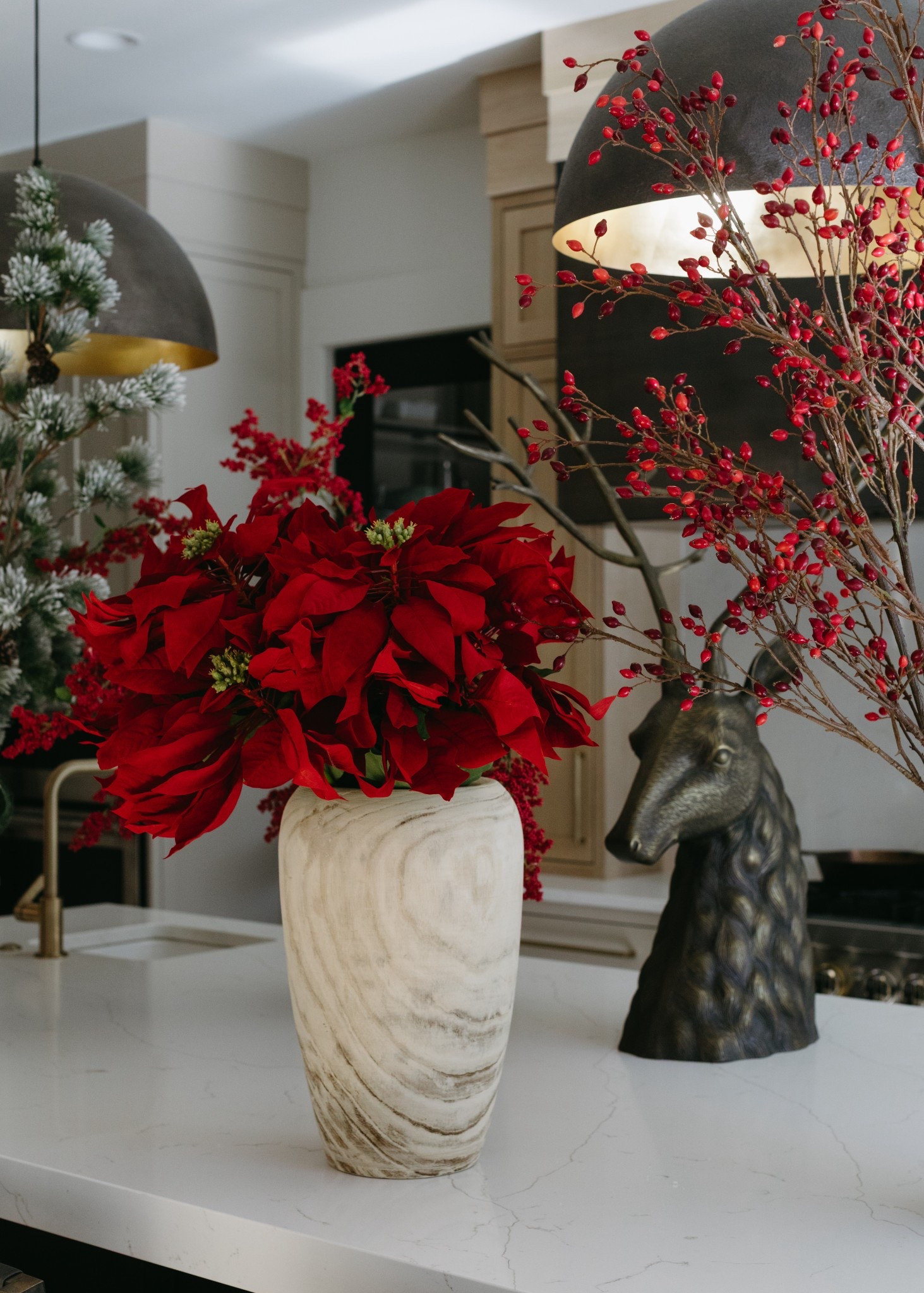 This faux poinsettia bundle is so pretty! Such a classic Christmas floral. Love the contrast with the wood vase. Favorite seasonal faux stems linked.

#LTKSeasonal #LTKHome #LTKHoliday