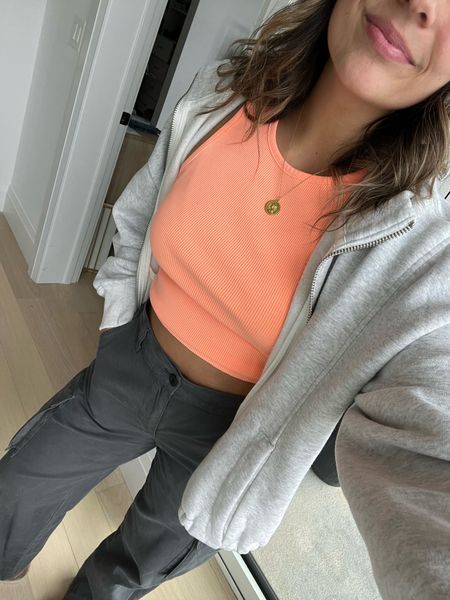 Comfy outfit - aerie tank top, Abercrombie zip up hoodie, Madewell cargo pants (SO CUTE ON - go down 1 size, wearing a 28) 

#LTKSeasonal #LTKunder100 #LTKFind