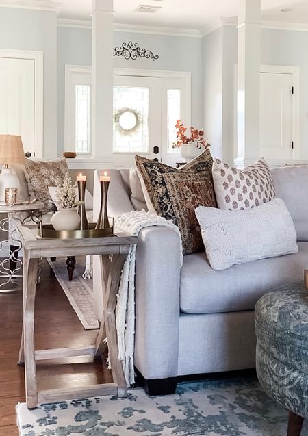 Fall living room refresh. Add a touch of fall to your space with fall, neutral throw pillows in different textures and patterns, brass candleholders, cozy throw blanket, brass tray, York sofa on sale at pottery barn, ottomans. Target, Etsy. 


#LTKhome #LTKSeasonal #LTKsalealert
