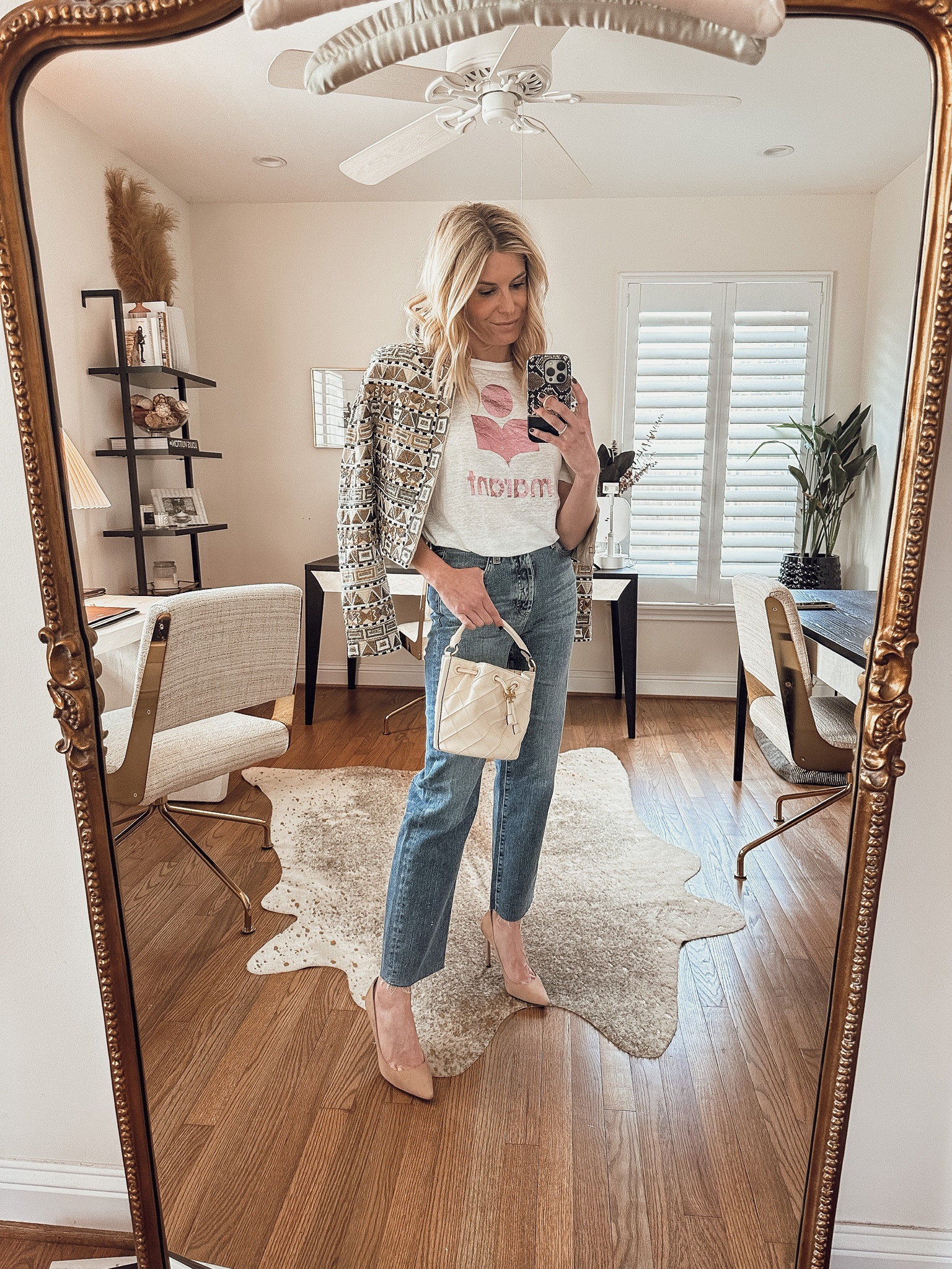 Veronica beard jacket, Isabel marant t-shirt, straight leg jeans, heels, and Tory Burch bag. 

#LTKstyletip #LTKworkwear #LTKFind