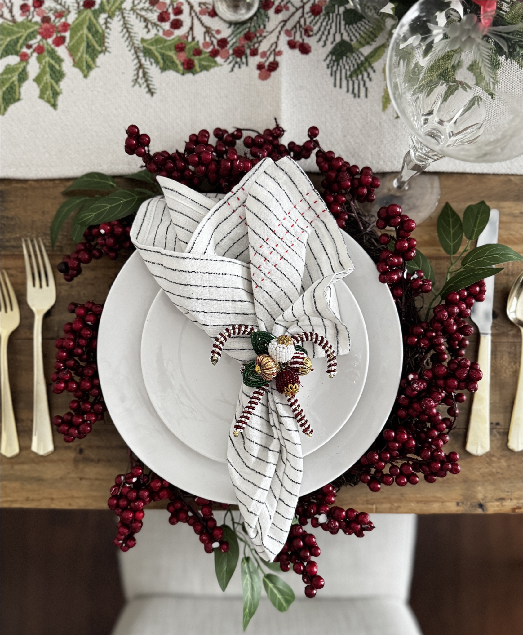 A Livable Luxe Tablescape using classic styling in red, black, white, and gold. Leaning into the Ralph Lauren Christmas theme. A nostalgic table setting. Using decor from Pottery Barn, Home Depot, and West Elm

#LTKSeasonal #LTKHoliday