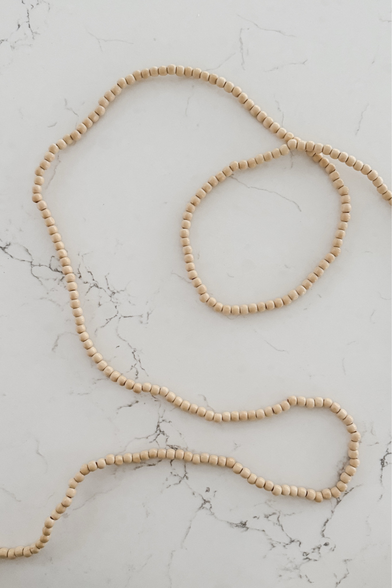 I’m going to try adding a new element to our holiday tree this year: wood bead garlands! I think it will be a nice visual element to complement our other ornaments, tree topper, and tree collar!

#LTKHoliday #LTKHome