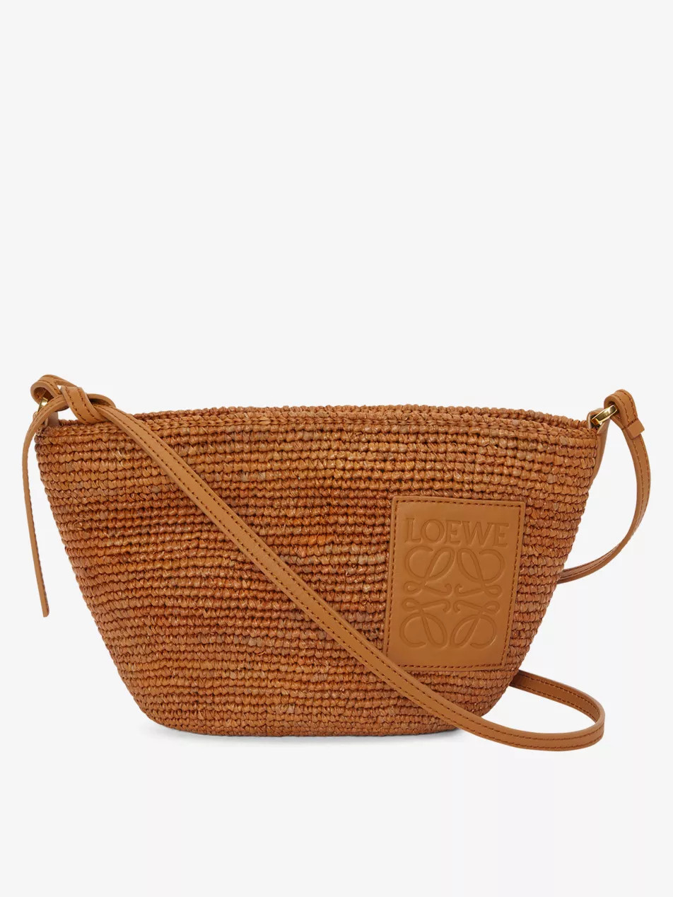 Slit Pochette raffia cross-body bag | Selfridges