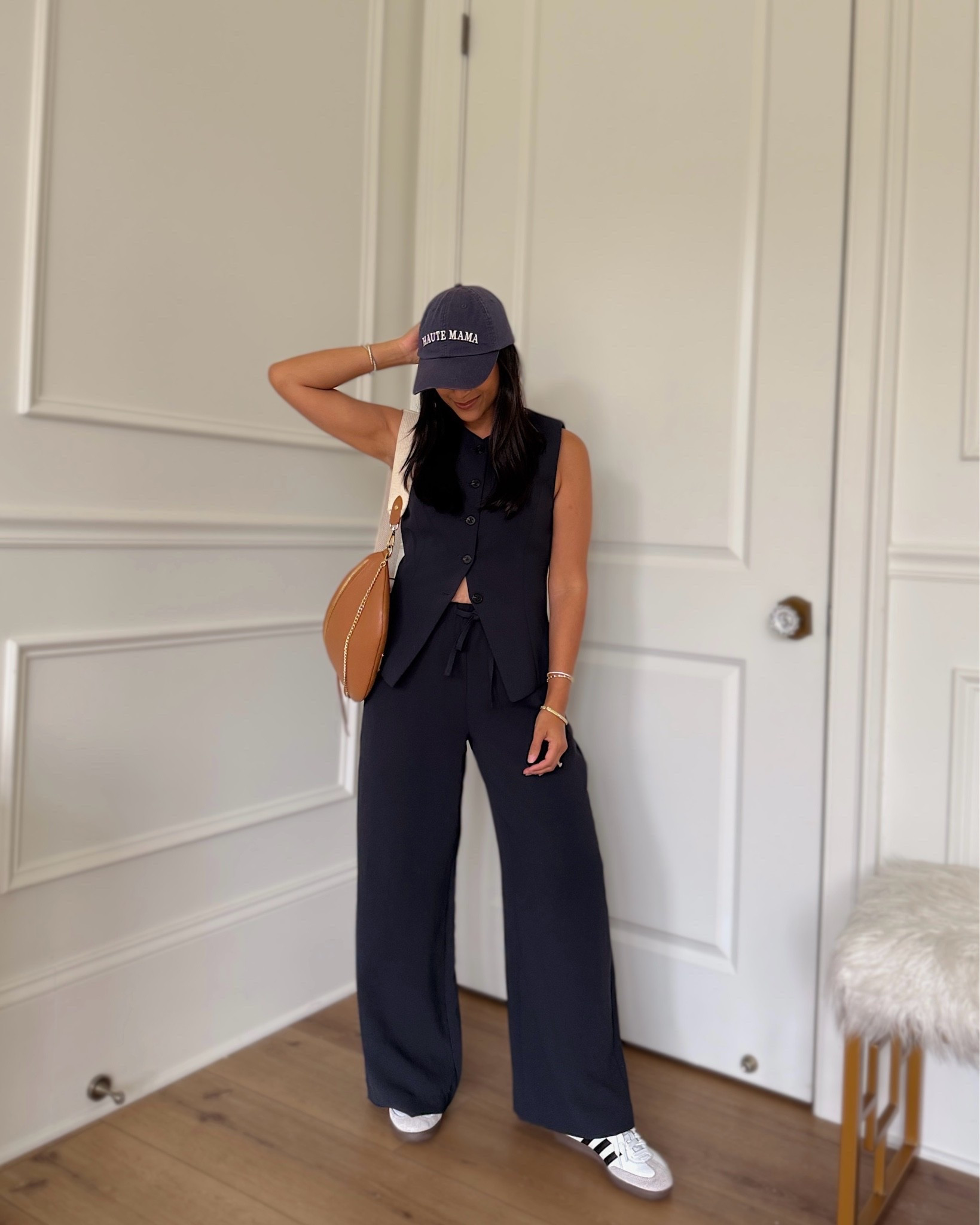 This whole set is currently on sale! Obsessed with these crepette pants and vest from @Aritzia  bc they’re wrinkle resistant! I own them in 4 different colors! They’re so versatile and chic! 
Take 20% OFF my Beck sling bag with code: HAUTE20

#giginewyork #ariztia

#LTKSaleAlert #LTKootd #LTKPetite