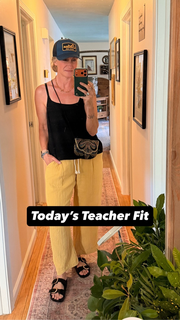 ☀️ A local downtown concert seemed like the perfect excuse to pull this one together.

A strappy linen top, gold crinkle barrel pants, comfy sandals, gold jewelry, & a navy trucker hat that somehow ended up being exactly what this outfit needed.

The funny thing is, I think my favorite part might be the purse. ✨

It’s a thrifted beaded bag with little bits of gold, blue, cream, & brown woven throughout it. The kind of thing that most of us buy, tuck away in a closet, & save for a special occasion.

Not anymore.

Lately I’ve been trying to wear the things I love instead of waiting for the “right” time.

The gold buckles on the sandals, the gold lettering on the hat, the gold jewelry, the gold pants… somehow it all came together. 💛

And honestly, that’s become my favorite kind of outfit.

Not because it’s trendy.

Not because it’s what someone says I’m supposed to wear.

Just because I like it.

Somewhere along the way we started worrying about what’s in style, what’s out of style, what we’re “supposed” to wear, & whether someone else will approve.

Who the fuck cares? 😂

Wear the purse.

Wear the hat.

Mix the gold.

Buy the pants.

And if the Urban Outfitters app happens to be responsible for the hat… well… maybe don’t judge me. 🤦🏼‍♀️😂

Life is way too short to save the good stuff for someday. 💛✨

☀️👜💛✨👒🌿🛍️🤎😎🎶

LTK: https://www.shopltk.com/explore/Teacher_Fits_by_Lora

#OldNavyStyle #OldNavyFashion #TargetStyle #TargetFinds #UniversalThread #LTKStyle #LTKFashion #SummerStyle #Over50Style #OOTD

#LTKgrwm #LTKootd #LTKSeasonal