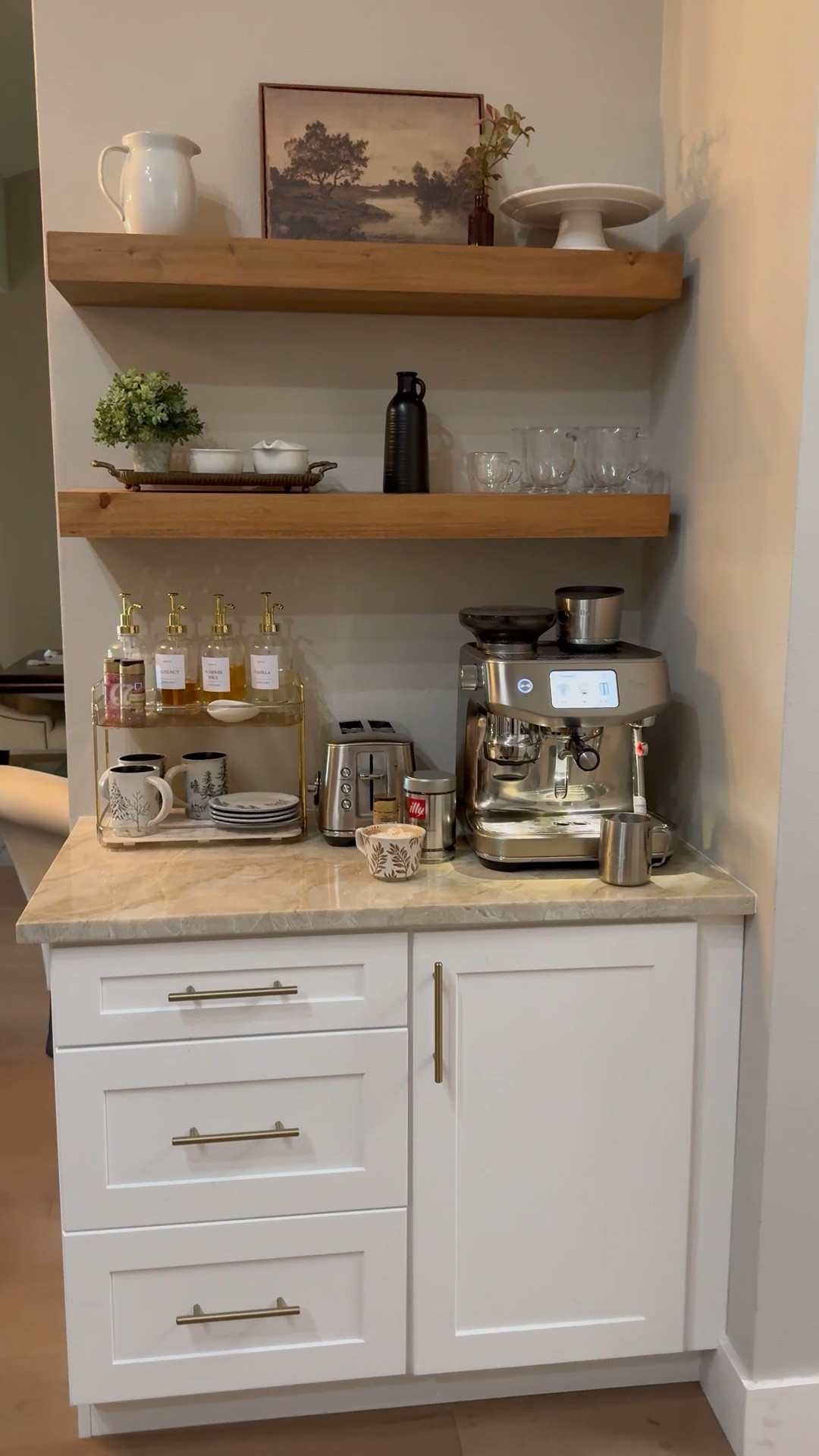 Coffee bar, morning cup of coffee treat, espresso machine, coffee station decor, floating shelves, kitchen decor , Breville Oracle Jet espresso machine 

#LTKmorningroutine #LTKdayinmylife #LTKHome