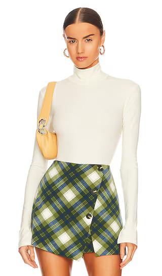 Turtle Neck Bodysuit in Ivory | Revolve Clothing (Global)