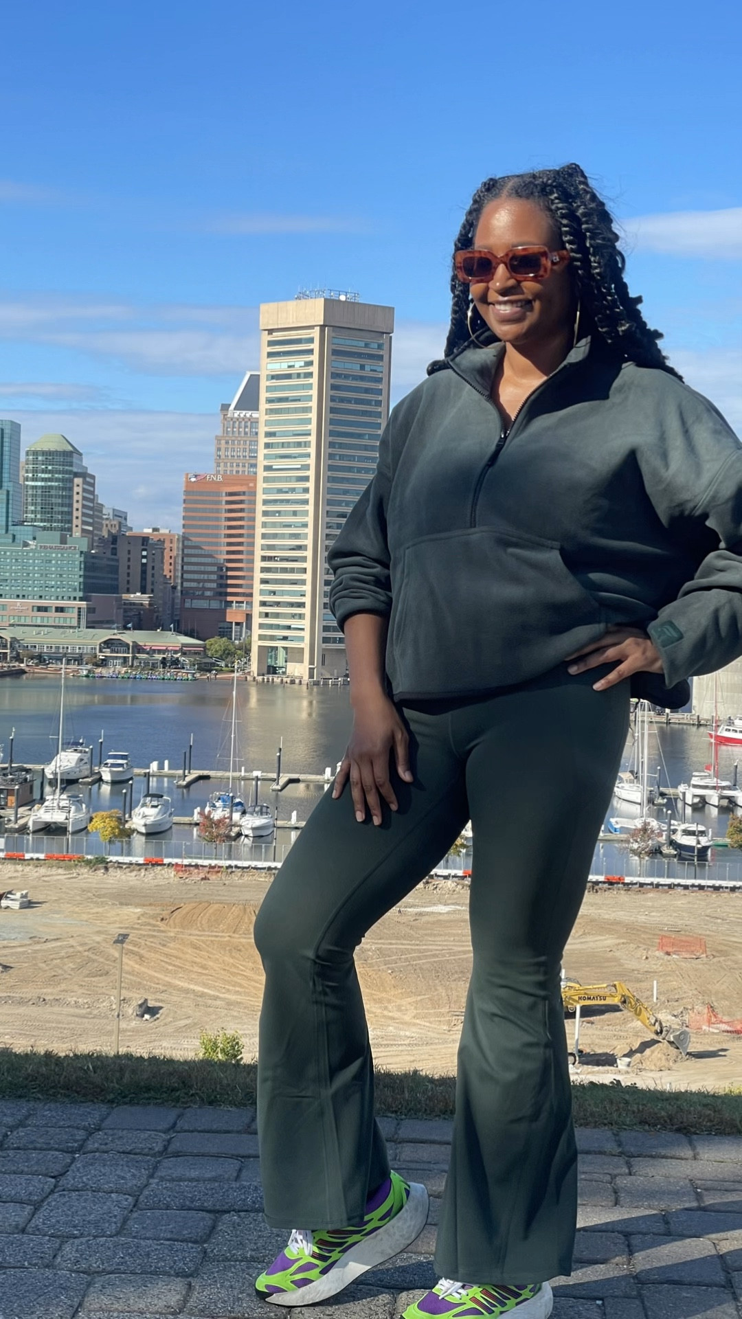 Crisp air, golden sunlight, and a backdrop of my hometown 💜 Rocking this @fabletics money green fleece pullover + flare pants — cozy season activated 🍂Fabletics.com/MoveInFabletics to access the VIP membership offer
 #Fabletics #FableticsPartner

#LTKSeasonal #LTKOver40 #LTKActive