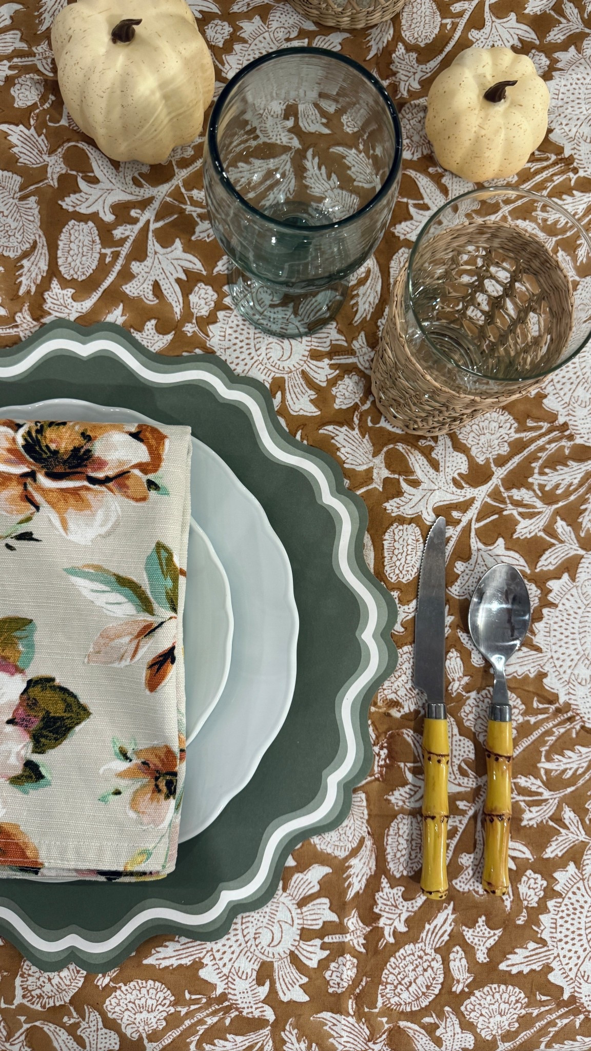 Thanksgiving table 🤎

table setting placemat glasses rattan table cloth traditional home decor fall decor 

#LTKHoliday #LTKFindsUnder100 #LTKHome