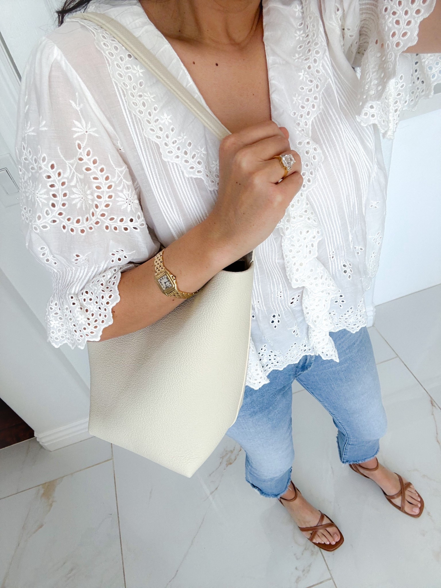 My everyday outfit on a hot day in California. Doen top true to size. Mother jeans true to size. Sandals true to size. The row bag. 

#LTKdayinmylife #LTKmomlife #LTKOver40