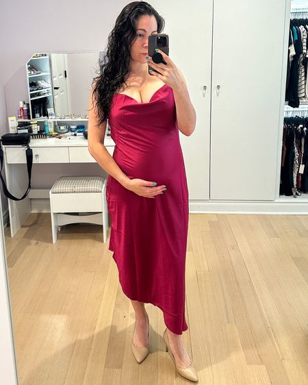 Cowl neck midi dress with asymmetric hem—sized up to a medium to be bump friendly and on sale at lulus. Love the burgundy color and might wear this as my baby shower dress. This is also great for date night or as a wedding guest dress. 

#LTKwedding #LTKbump #LTKunder50
