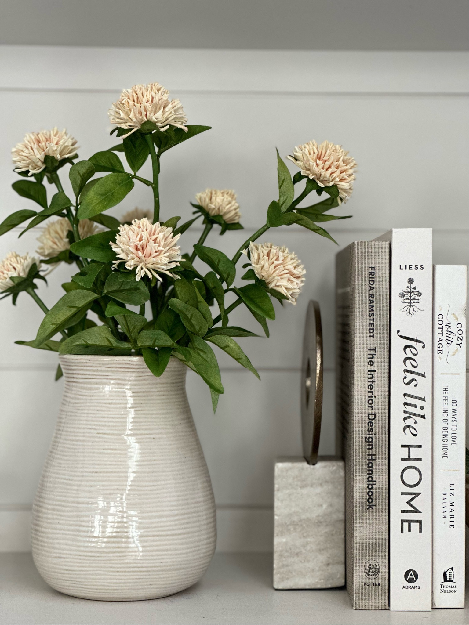 Pretty faux stems. Book shelf styling. Faux flowers. Decorative object. Coffee table books.

#LTKhome
