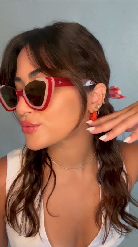 A red moment ❤️

Accessorizing with Lele Sadoughi is always the most fun 🫶🏼✨

Summer style, sunglasses, hair bow, earrings, statement earrings, party, preppy, red sunglasses, gingham. 

#LTKVideo #LTKFestival #LTKParties