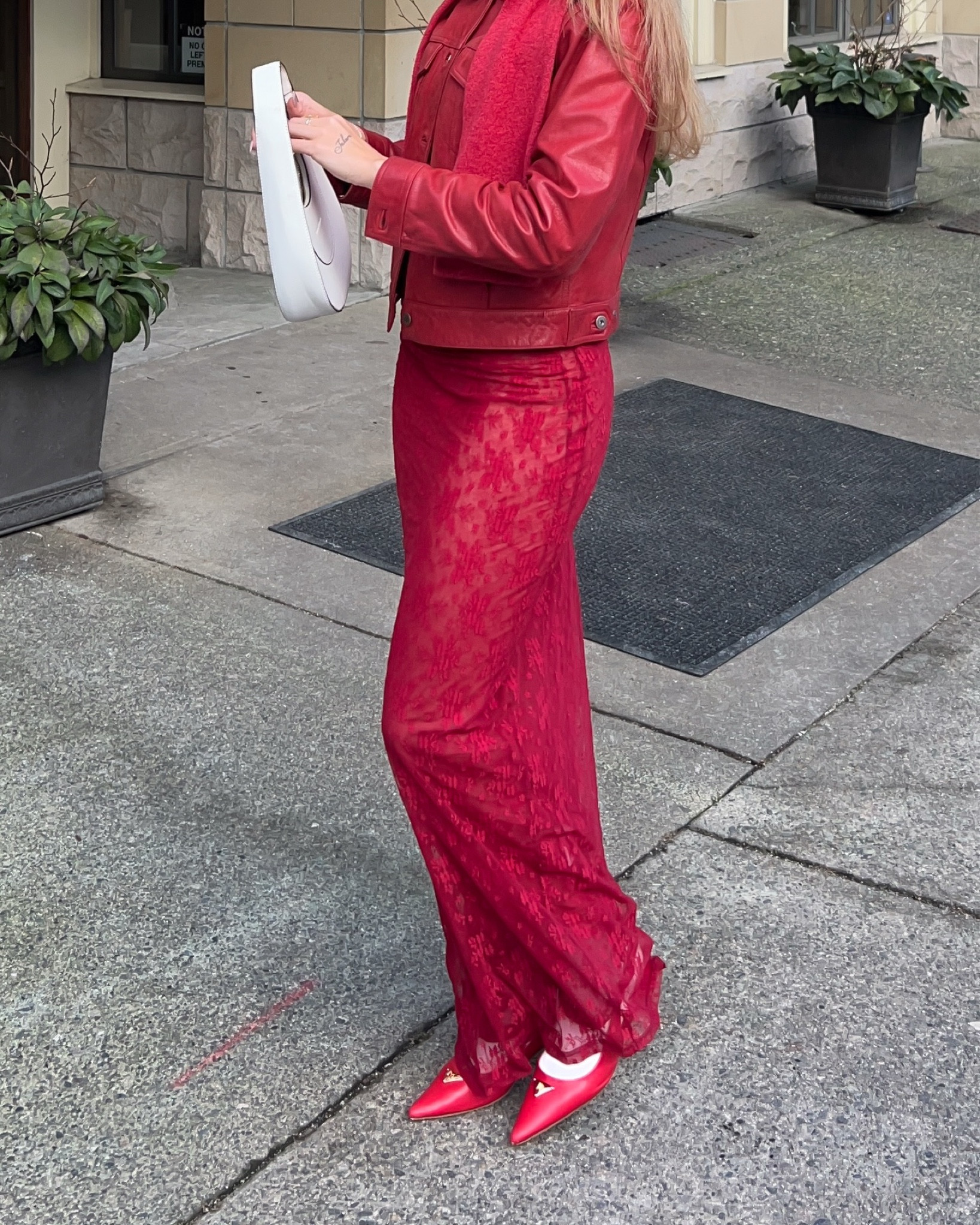 Red see-through dress, red maxi dress, red kitten, heels, red leather jacket, all red outfit, streetwear women’s chic style