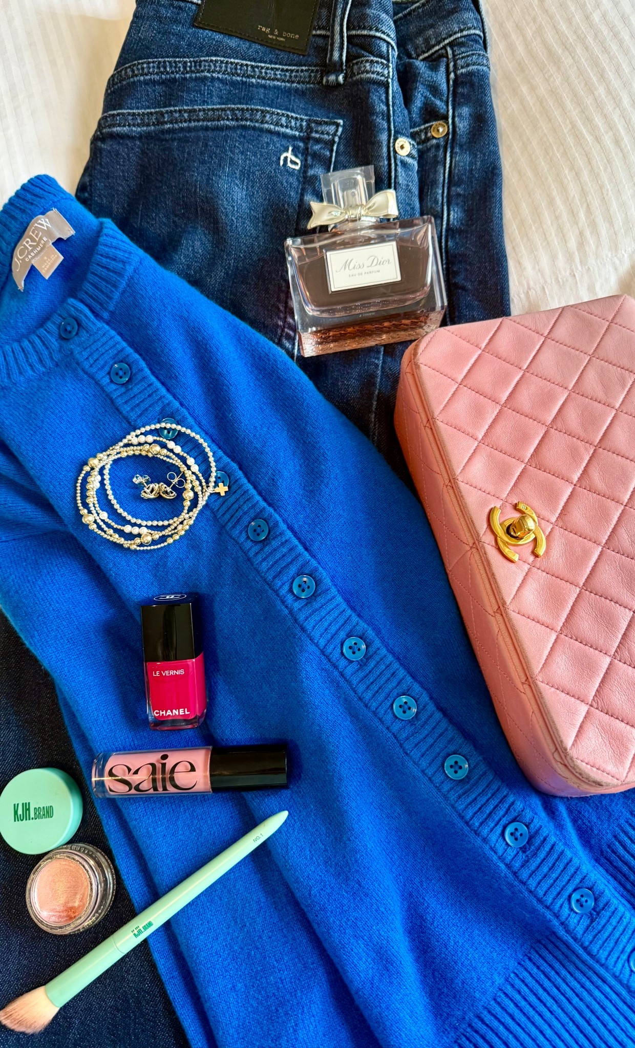 Adore these pops of color with the rich blue sweater and my Mum’s vintage pink Chanel handbag. These jeans are THE BEST. They are so soft and comfortable! For the longest time I’ve hated the feel of mid rise jeans but these are so soft and move with you and are SO FLATTERING!!! Trust me, worth the price. If you wear jeans almost every day like I do it makes sense to spend a huge part of your wardrobe budget on the most comfortable and best fitting jeans  for your lifestyle and body type. I’m a complete convert to these! I wanted to also say the highlighter pictured here is from Katie Jane Hughes, a British makeup artist and it’s really swell and I highly recommend you look her up. She has a lot of great makeup tutorials on social media and she really LOVES BLUSH!!! #lcmlfestyle #brightblue #pink #missdior

#LTKdayinmylife #LTKBeauty #LTKSpringSale