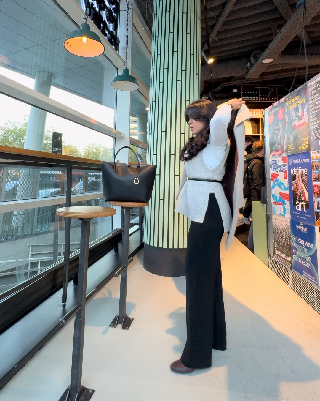 Stepping into the week with confidence! This chic white top and vest, paired with a black sling belt, dark brown boots, and my go-to black tote bag, is my power combo! 💫

#LTKnederlands #LTKworkwear #LTKeurope