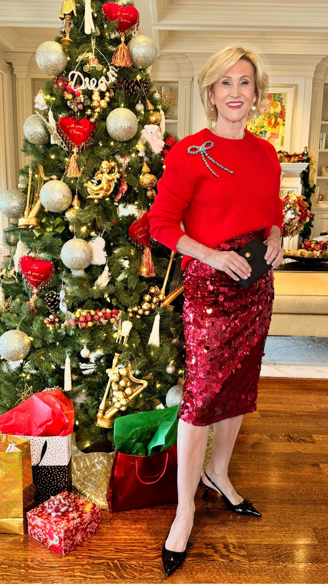Holiday dressing with a little drama ❤️✨
This red sweater from Macy’s with the sweetest bow detail on the shoulder paired with a red sequin skirt is giving festive, fun, and just the right amount of extra. Because if there’s ever a time to go all in on red and sparkle, it’s the holidays 🎄✨

#LTKHoliday #LTKOver40 #LTKSeasonal