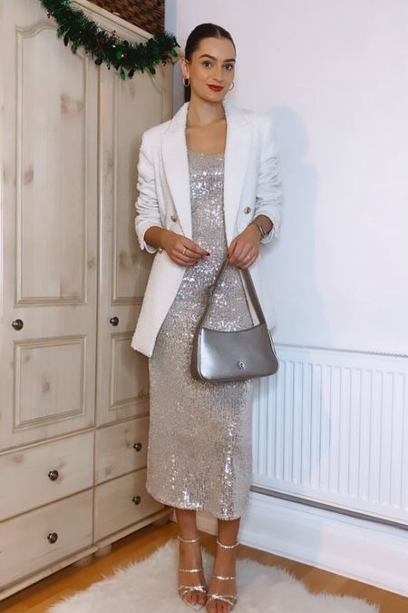 7 Days, 7 Party Outfits Day 7✨
White blazer, sequin midi dress, silver bag, sequin heels, red carpet red lipstick

#LTKHoliday