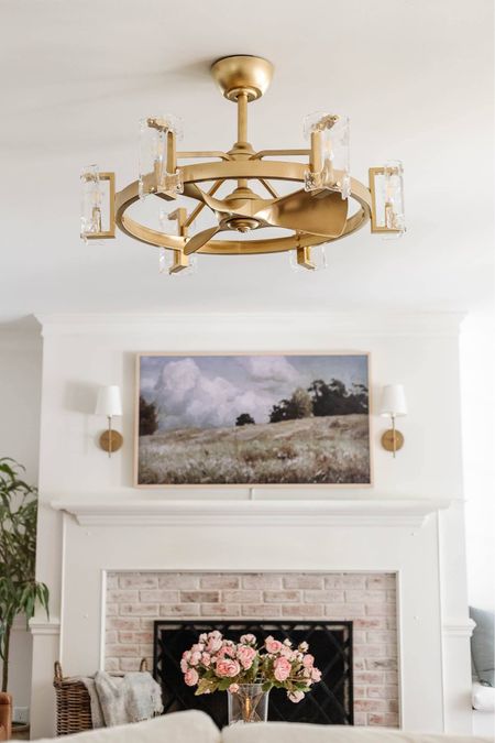 We painted the fandelier gold!
#LivingroomDecorations #ModernCeilingFan #StylishCeilingFan #fandelier #FireplaceDecor #MantleDecor #FrameTV #LandscapeArt #wallsconce #Mantle


#LTKhome #LTKstyletip