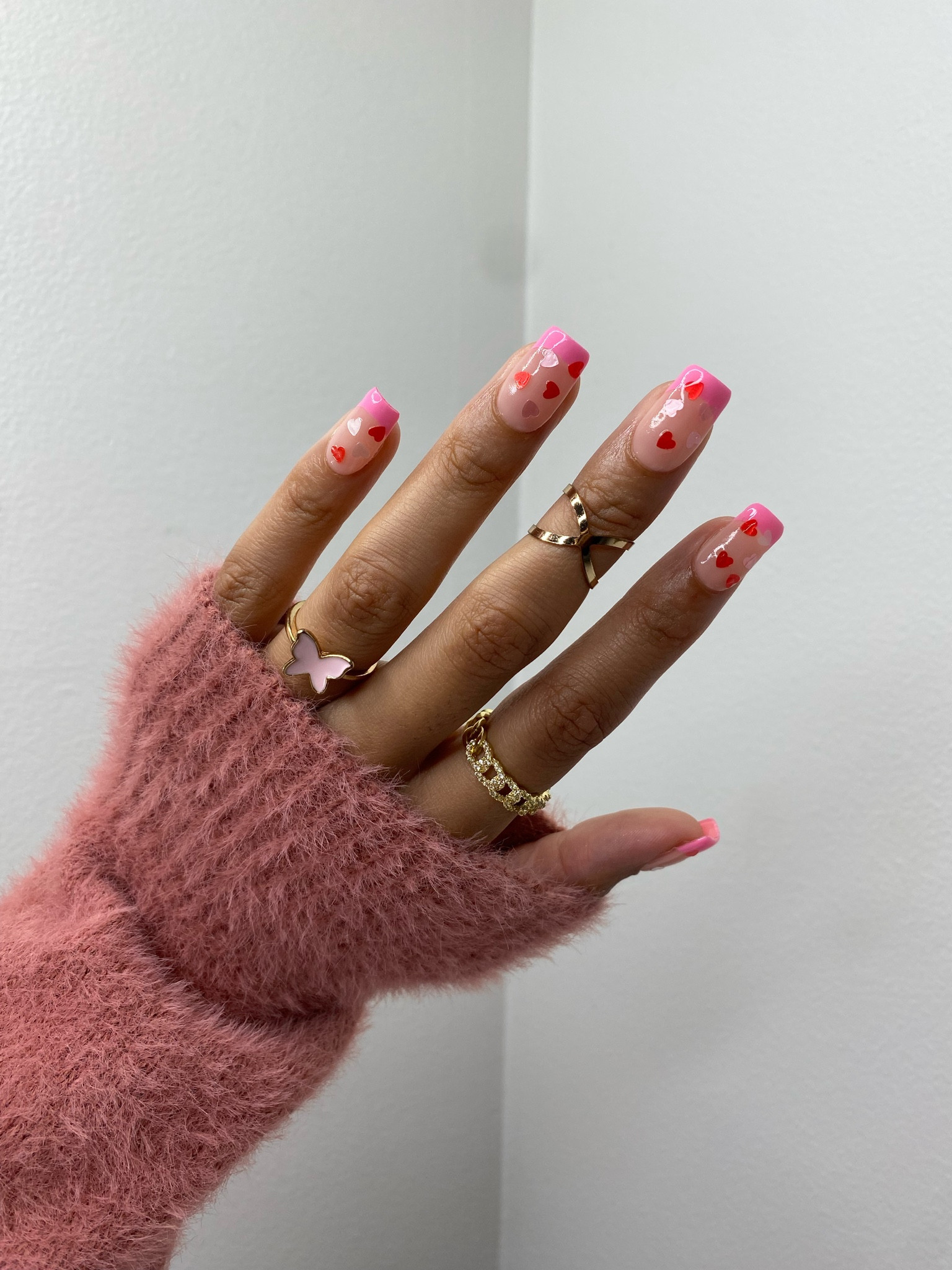 Pink French tips and heart Valentine’s Day nails 

#LTKunder100 #LTKSeasonal