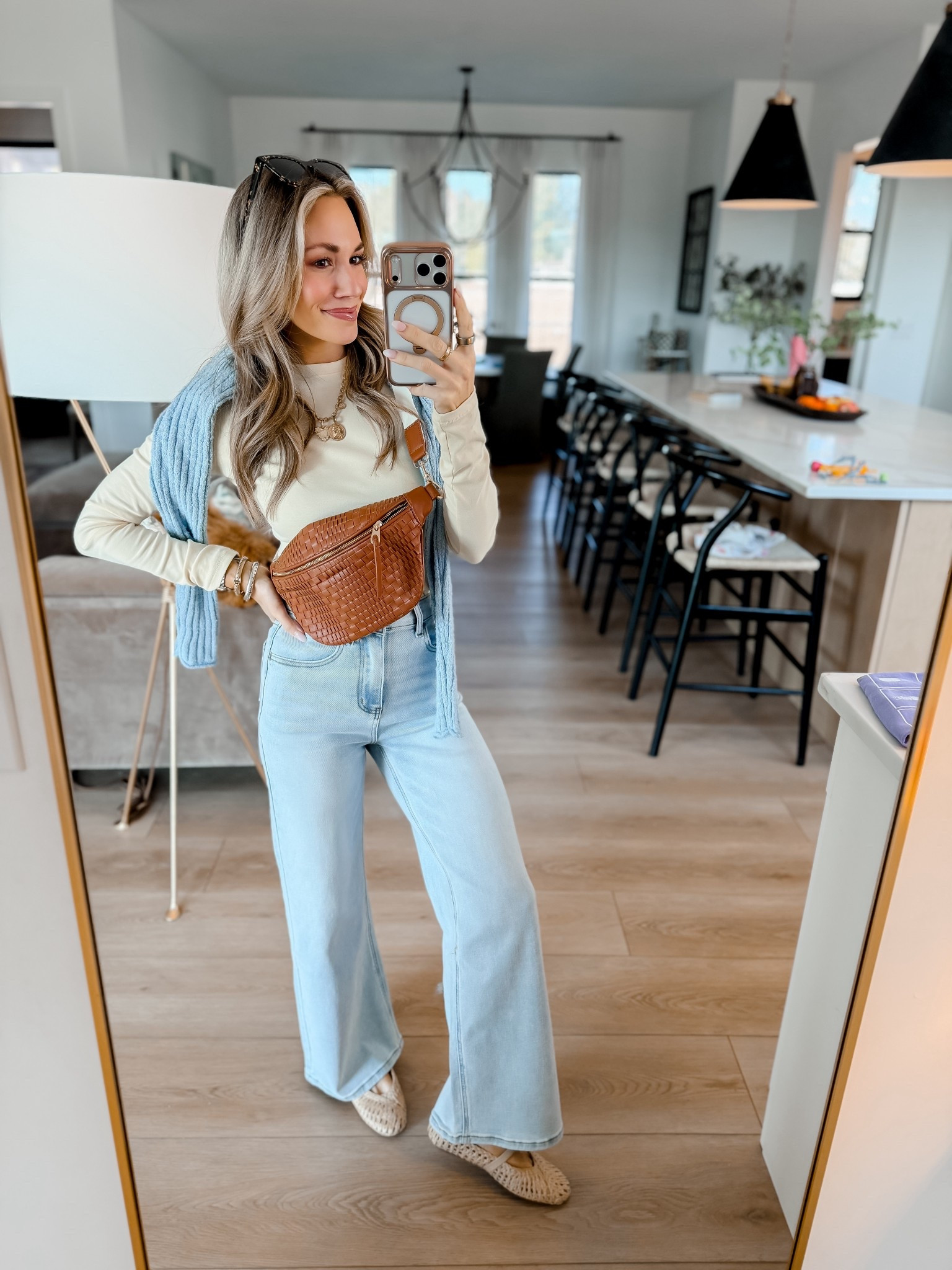 Amazon Casual Outfit! I have this top in so many colors, it’s so comfy! And these jeans are so flattering! Perfect for errands, lunch with friends, sporting events, mom life, & more! // I’m 5’3 for reference wearing a small top, 24 jeans, and xs sweater. Flats run tts.