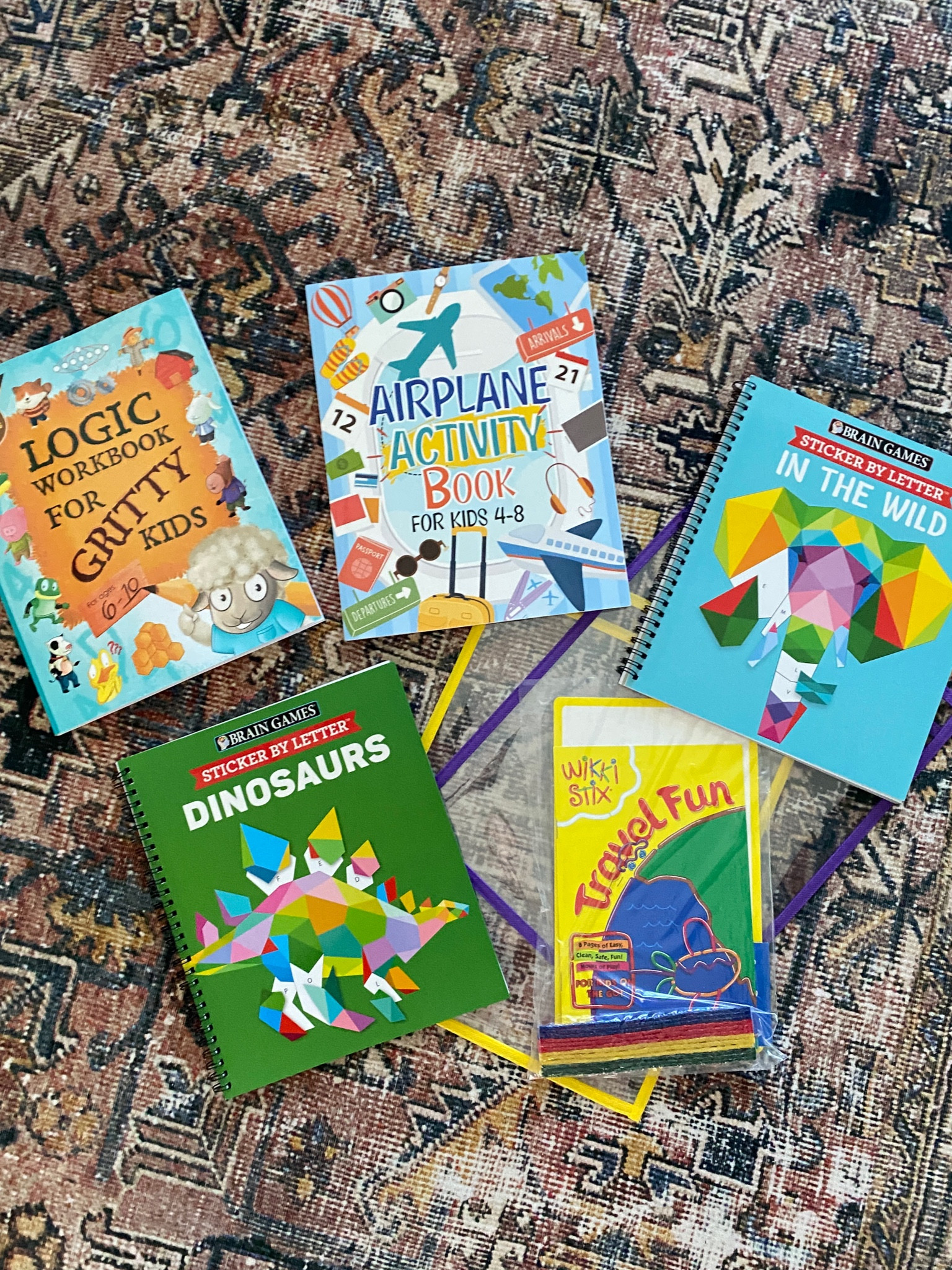 Got travel activities for my 5 & 7-year-old to help them pass the time on our ✈️