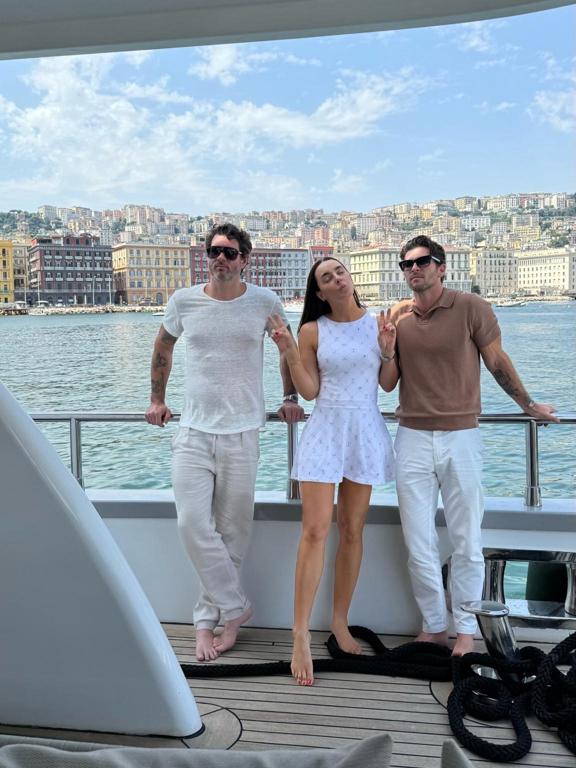 Another vacation look. Obsessing over this We Wore What dress 🤍