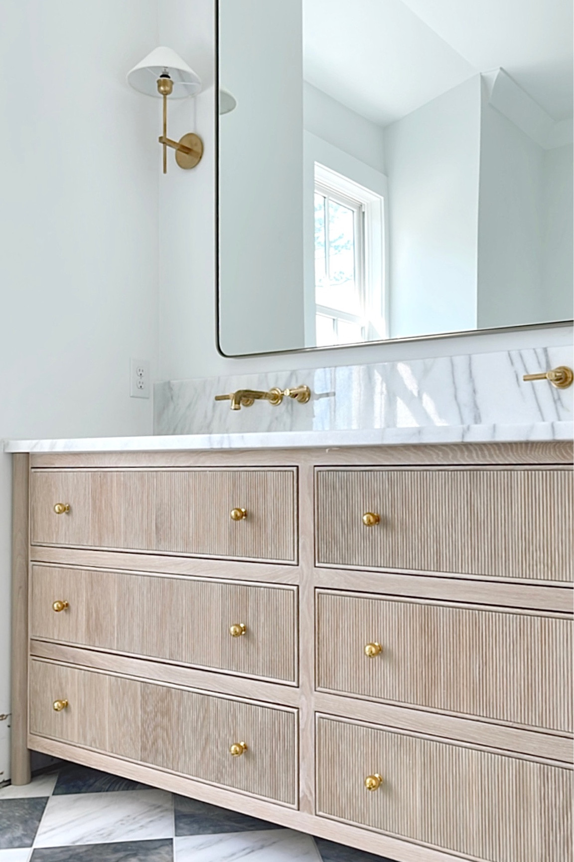 Primary bathroom, bathroom hardware, master bathroom, brass wall faucet, bathroom Sconces, brass sconces, gold square mirror, brass bathroom mirror, bathroom design, bathroom lighting 

#LTKhome #LTKunder50 #LTKFind