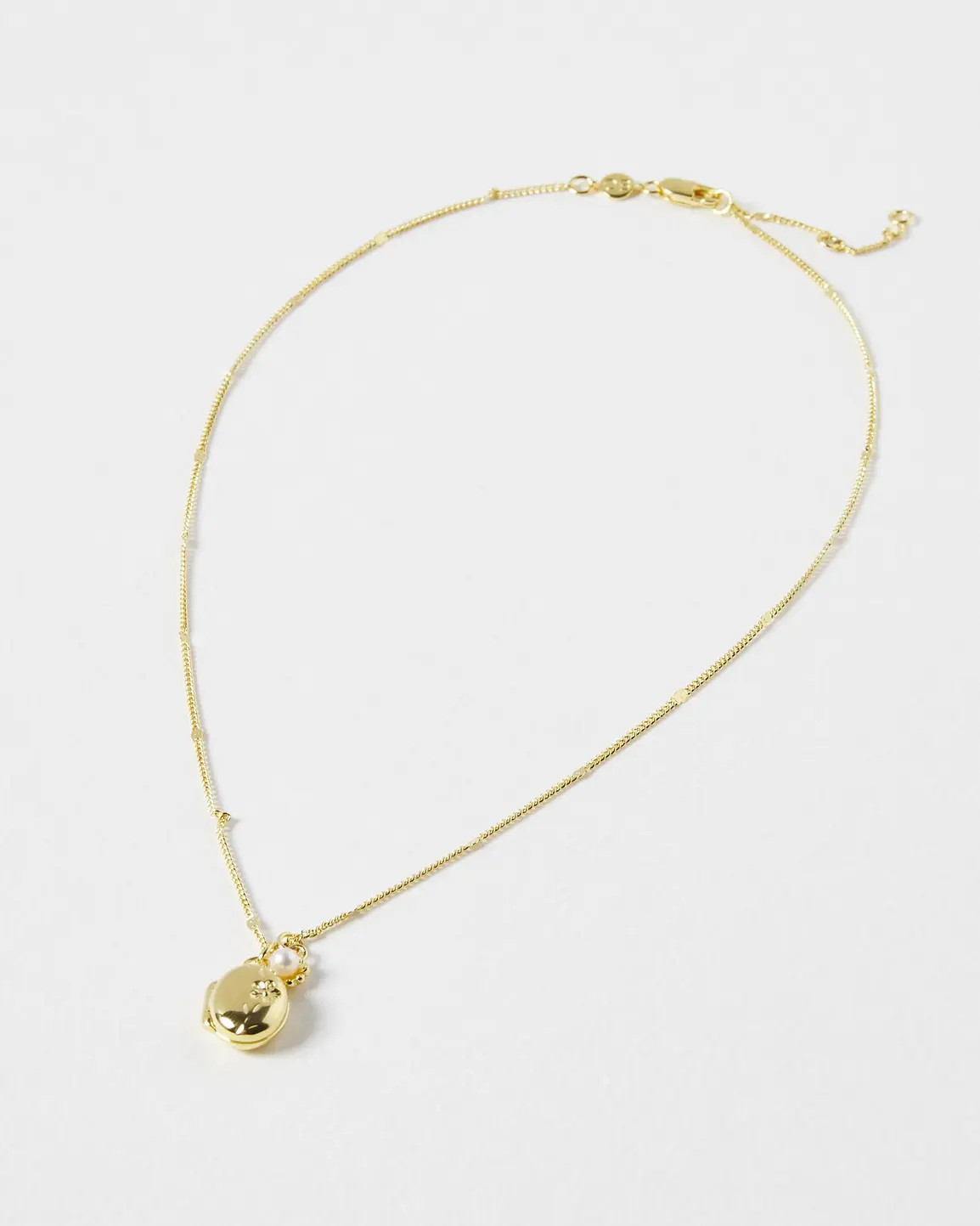 Bailey Oval Engraved Locket & Pearl Flower Gold Plated Pendant Necklace | Oliver Bonas (Global)