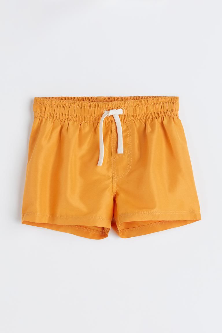 Swim shorts with an elasticized waistband with drawstring and mock fly. Soft, mesh liner shorts. | H&M (US)