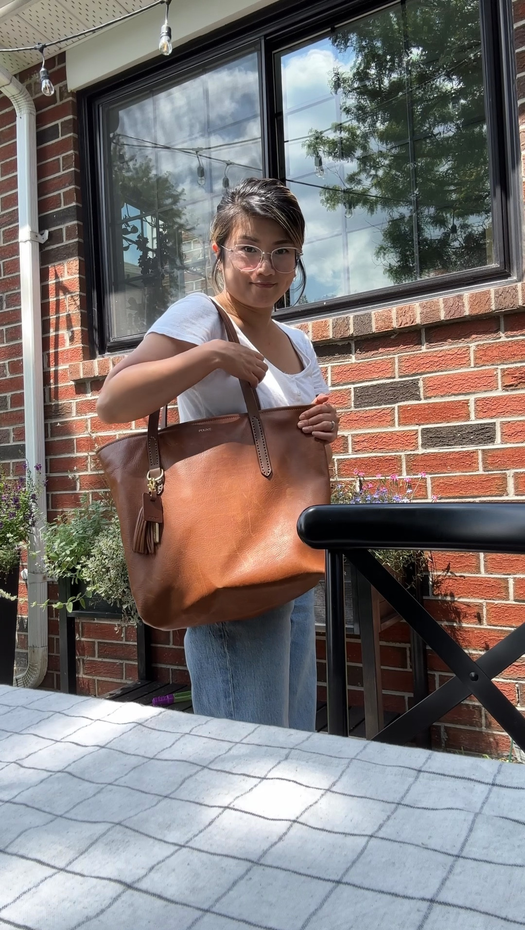 This bag is my work bag. It’s big but still stylish and beautifully made. It can hold so much weight and so much stuff. Incredibly strong straps and I customized it with a tassel key chain and monogram tag. So so cute. I love taking it to work with my laptop, iPad and entire set up I need to edit and work at a coffee shop  

#LTKVideo #LTKStyleTip #LTKWorkwear