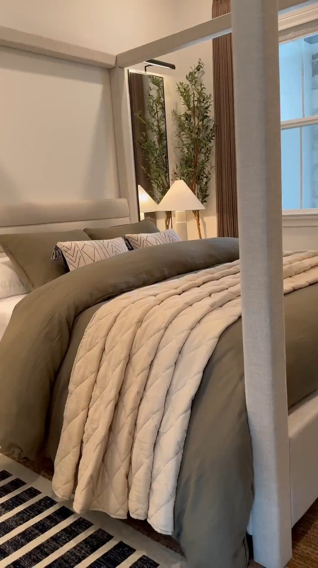 I used two duvet inserts to create that fluffy look.. plus i added a throw blanket under the rolled part! 🤎 Bed size is a Queen and the duvet+inserts are King size. I like sizing up on bedding bc it gives more fabric to work with especially if you want your bed to look full around! 😊

Measurements: 

Bed: Queen 

Duvet: King size - I inserted 2 King sized down inserts to give the bed a fuller look. Sheets & pillows are Queen sized 

Mirrors - 58" H x 18" W……mirrors will make your space feel larger as well as reflect light to other parts of the room! 

Drapes: Color Cafe Brown … Size 40"W x 108" W 

Sideboard in front of the bed was bought internationally but I linked a similar one below - Great price too!! 🤎

I used the “small table lamp” (linked) to create the glow effect behind the planter. I recommend  warm white light bulbs 😊

#LTKSaleAlert #LTKHome #LTKStyleTip