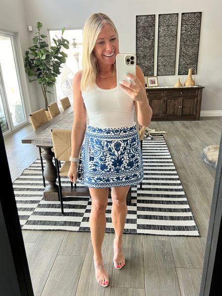 Love this blue and white embroidered skirt with a white tank top and clear sandals. Size small skirt and medium tank top. Tank runs small size up.


#LTKOver40 #LTKSeasonal #LTKStyleTip