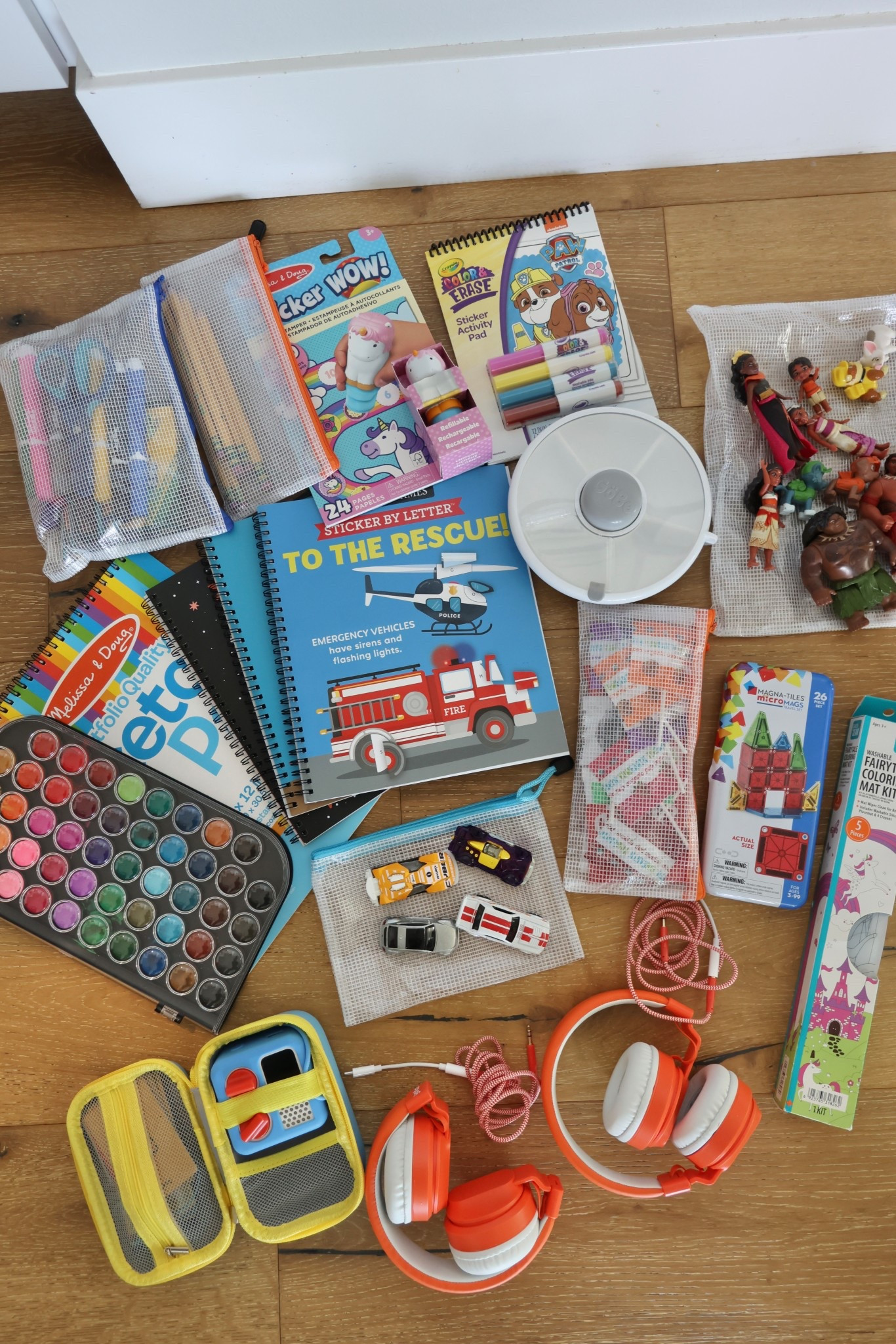 Airplane travel with kids—here’s what I’m packing in a backpack for them! 