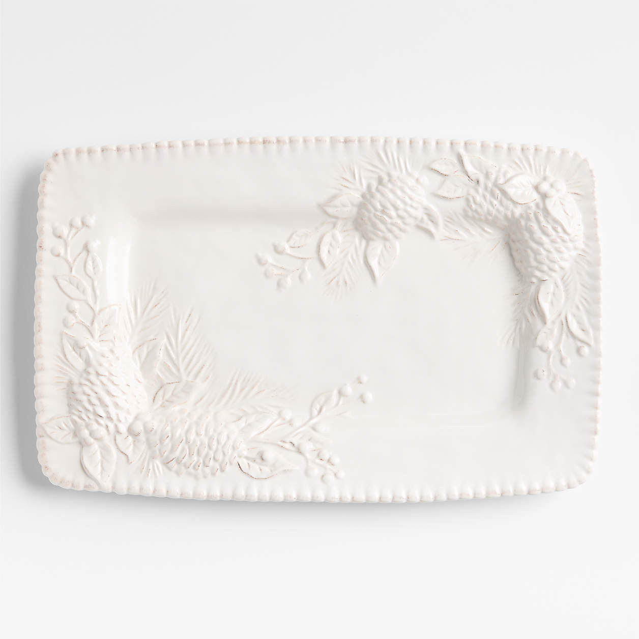 White Embossed Pinecone Stoneware Platter | Crate & Barrel | Crate & Barrel