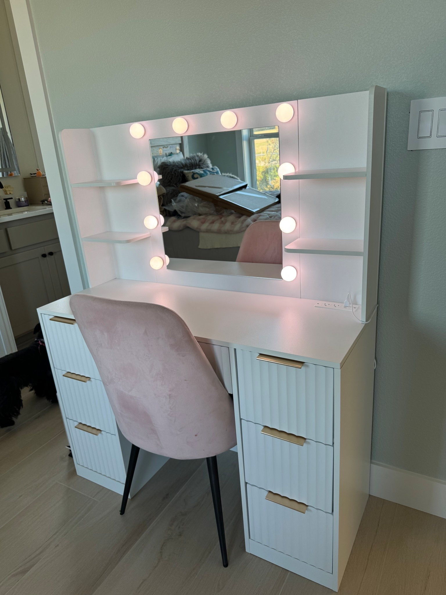 The fluted detail with the gold handles on my daughters makeup vanity is so pretty! She loved how this vanity has shelves and lots of storage drawer space, a built in outlet on the table surface and built in mirror #vanity #makeupvanity #teengirlsroom #girlsroom 

#LTKHome