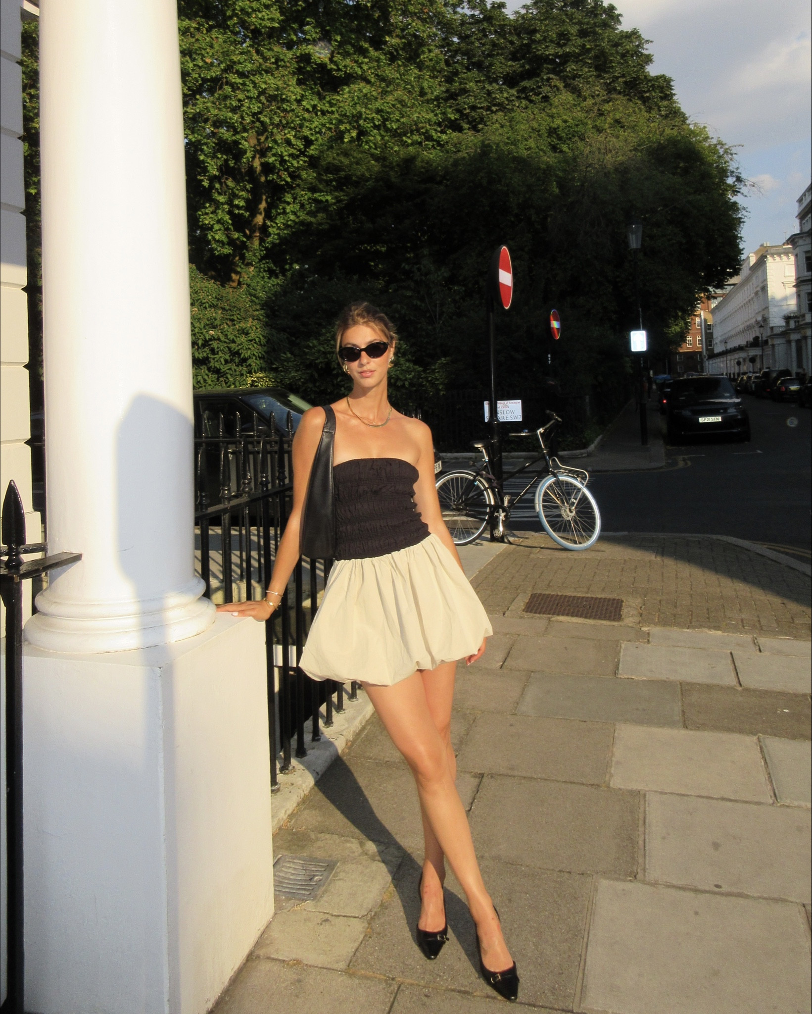 Short summer dress, bandeau top, voluminous baloon skirt

Celine cateye sunglasses 
Black bag Le Tanneur
Black heels

#LTKeurope #LTKluxury #LTKgetaway