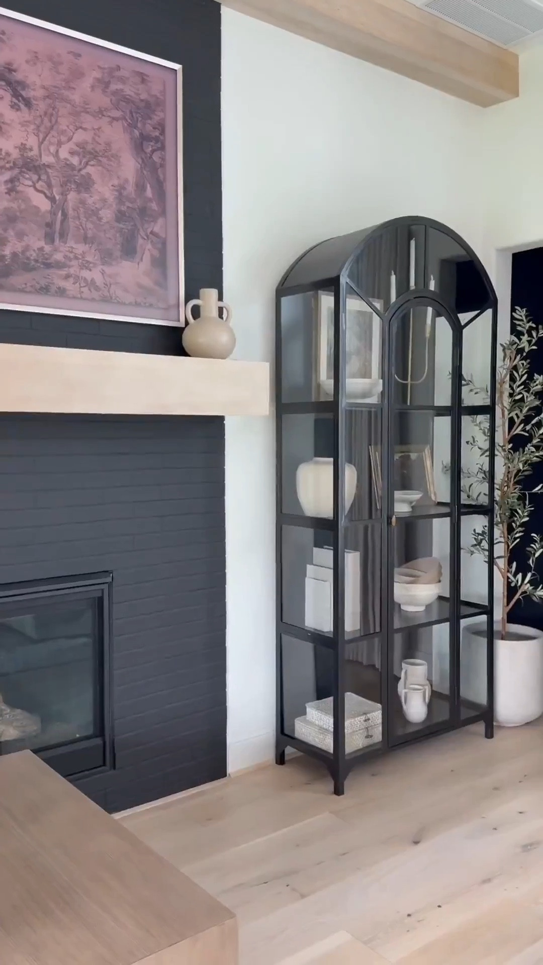 🤎
I've loved this classic cabinet for years plus it's truly a timeless piece that feels heirloom-worthy. ☺️ I love the
arched detail and glass panels that make it look like a work of art.

I now have three in my home! Two in the sitting room and one in the family room — and honestly, l'd add more if I had the space 😬😍

It's perfect for styling any room: dining area, next to a fireplace, bedroom, even an entryway. Solid and sturdy yet surprisingly easy to move. I love filling mine with neutral decor and adding a subtle pop of gold for warmth and contrast. A forever favorite 🖤

👉 I’ve linked the exact product plus similar options for easy purchase!

#LTKHome #TimelessDesign #HeirloomQuality #HomeDecorFinds #ClassicStyle #InteriorInspo

#LTKSaleAlert #LTKHome
