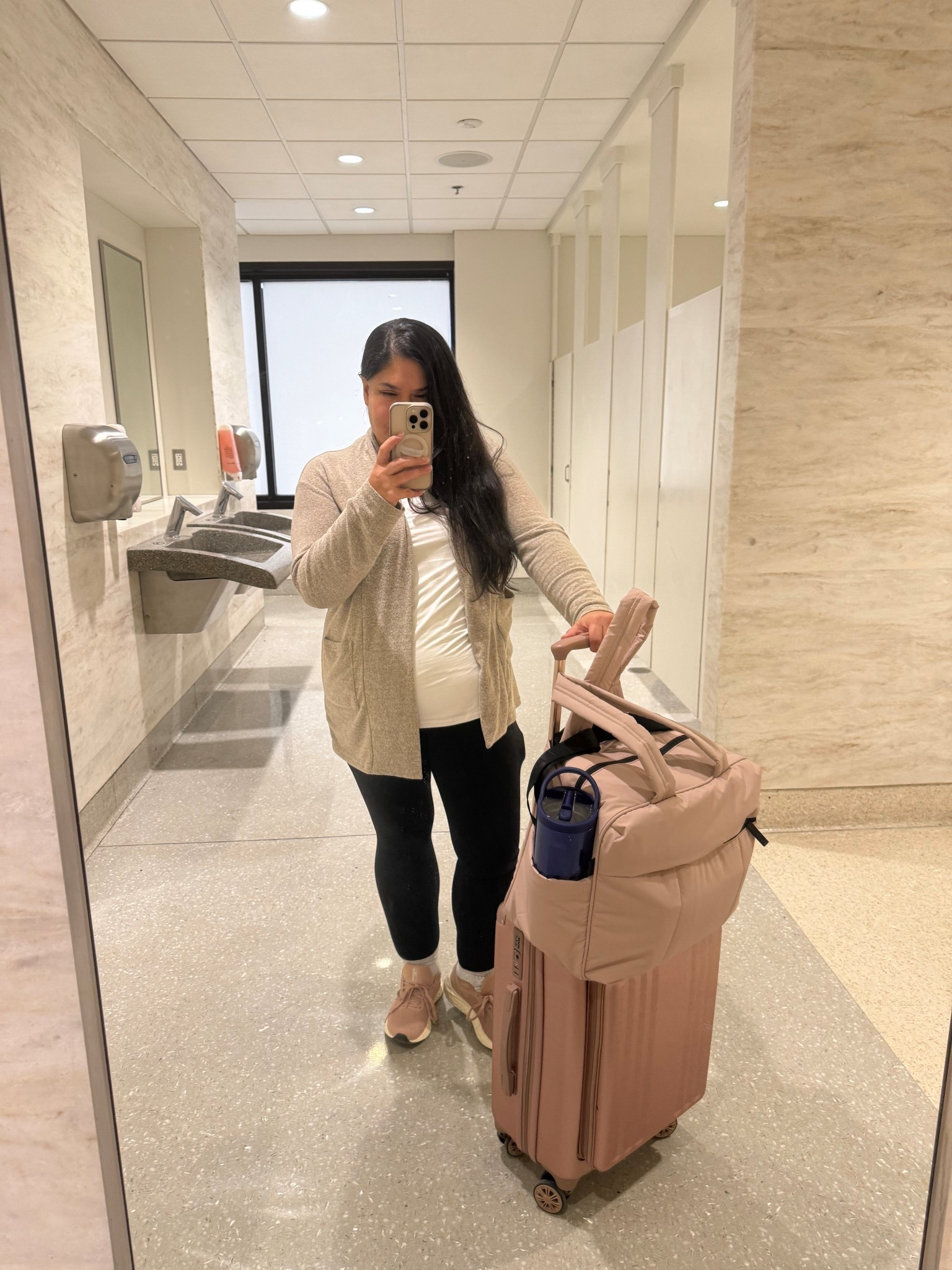 Officially obsessed with my @CALPAK Luka Duffel. It fit SO much stuff, including my dslr and two tripods. 

#LTKTravel #LTKgrwm #LTKdayinmylife