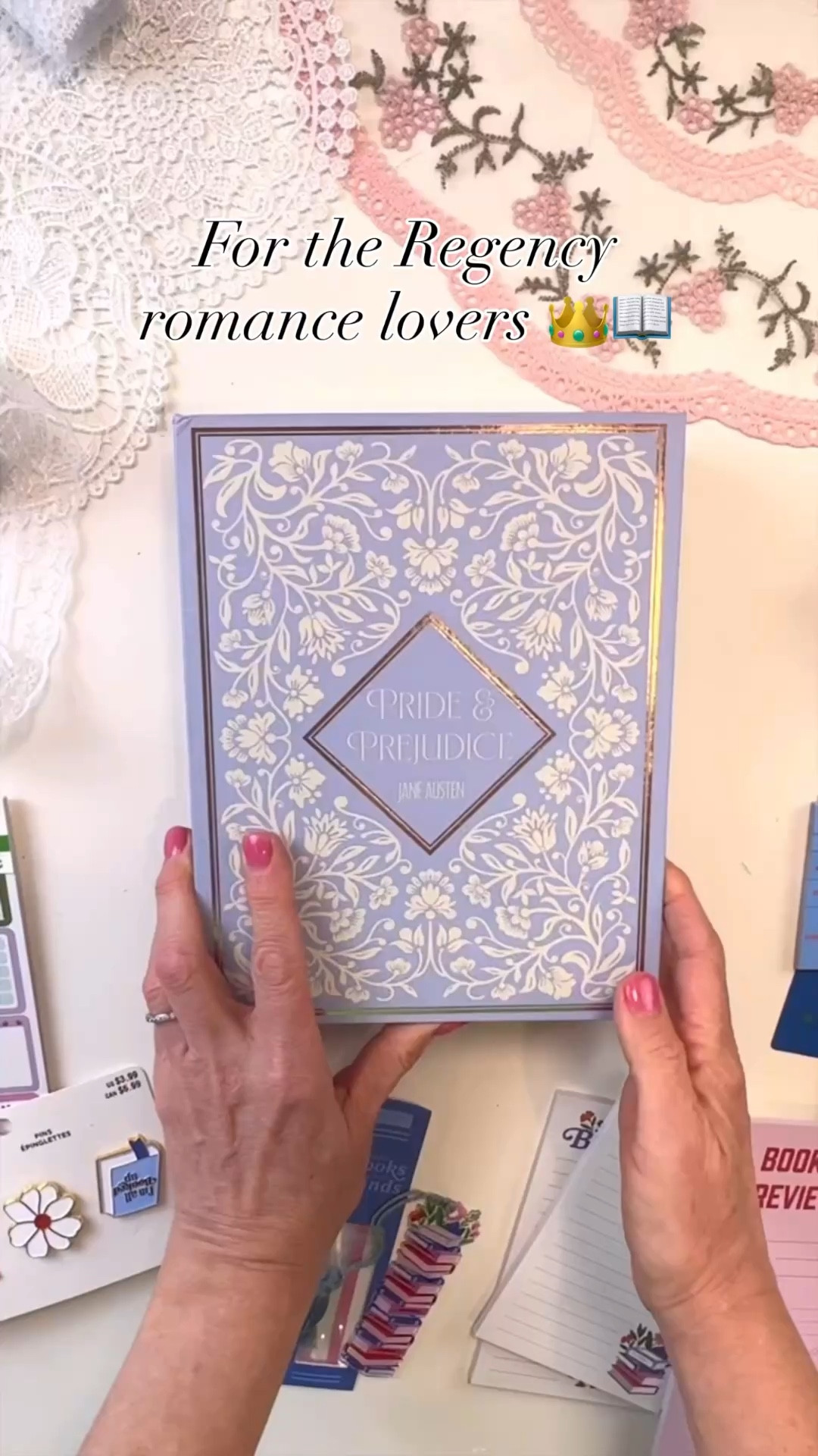 Bridgerton is back… so I made the ultimate fan gift for book and series lovers 👑📚
If you’re a Regency romance lover — the gowns, the longing glances, the scandal — this one’s for you
 
I started with a Pride & Prejudice book box and filled it with all the literary essentials:
✨ bookmarks
✨ notecards
✨ reading logs
✨ stickers & Post-it notes
✨ pens + bookish extras
 
Then I closed it up and tied it with lace and a gold + pearl brooch for that heirloom, corset-core finish
It feels like something Lady Whistledown herself would deliver. 💌
 
Perfect for a Bridgerton watch party hostess, your book club bestie, or your favorite romance reader.
 
For more fun projects & DIYs, follow @michaelsstores and share how you #makeitwithmichaels #michaelsmakers #everythingtocreateanything #ltkgifts
#regencycore #booklovergift

#LTKSeasonal #LTKstorytime #LTKHome